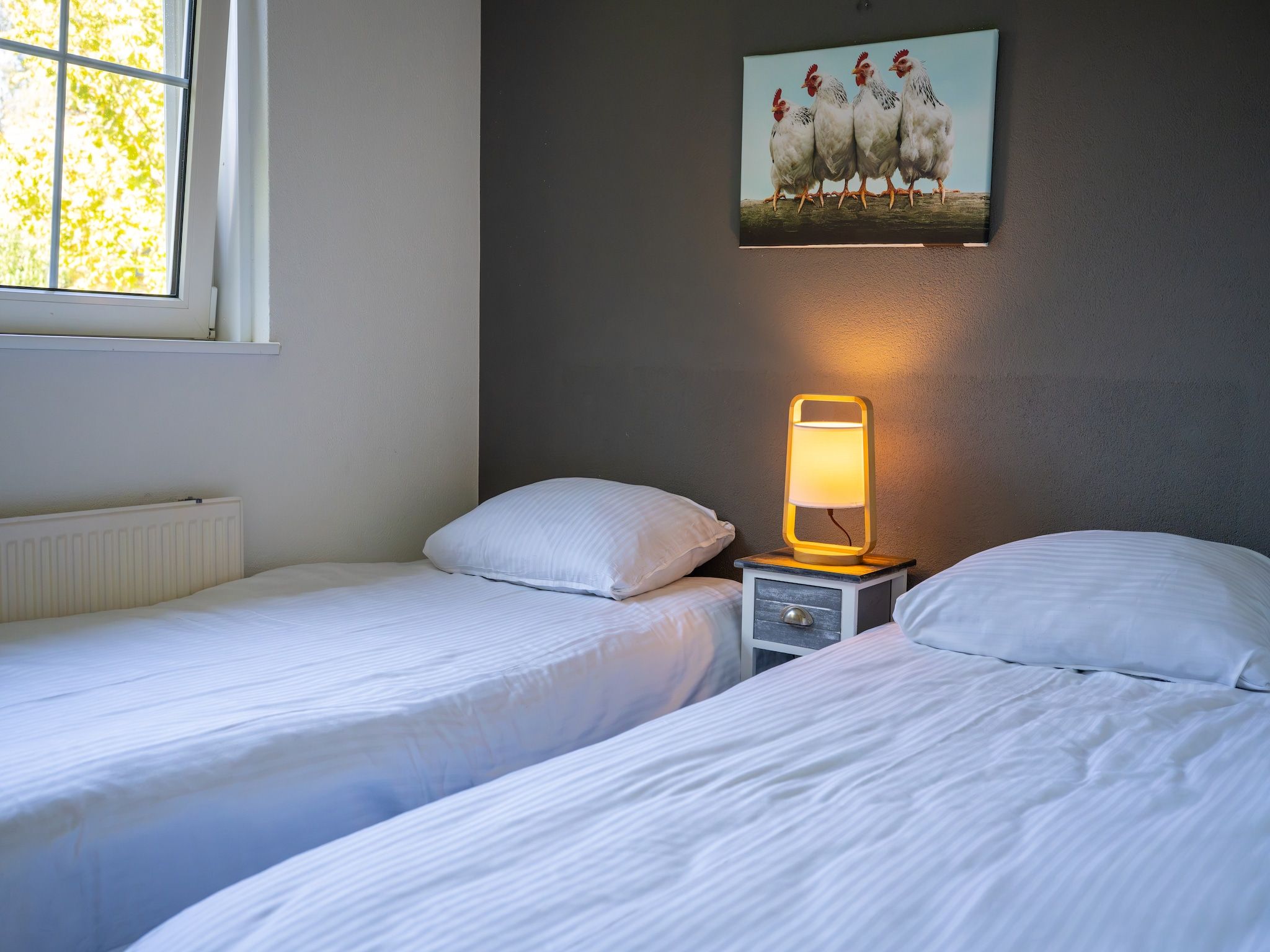 Een slaapkamer van Villapark De Weerribben 5 in Paasloo