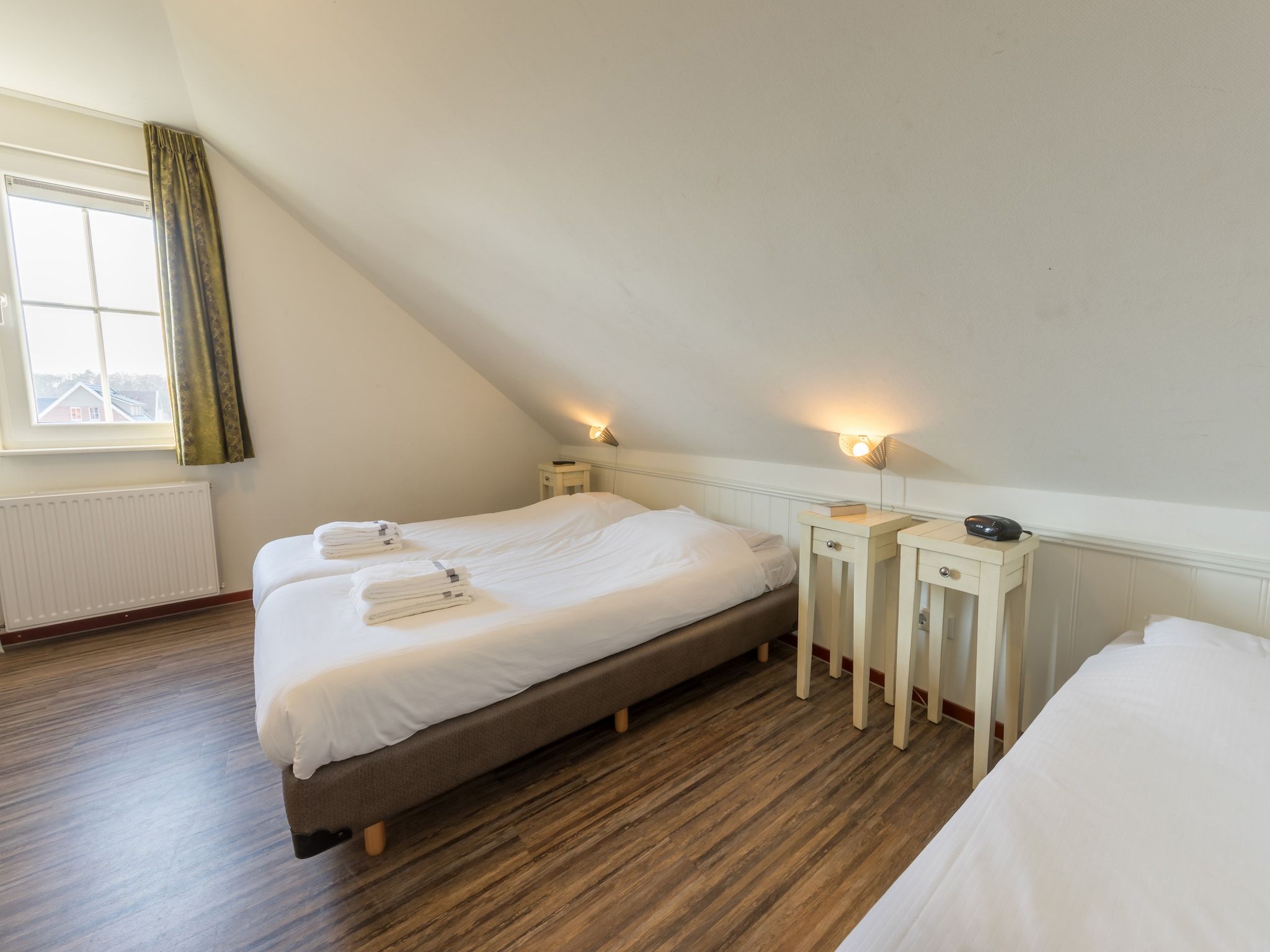 Een slaapkamer van Résidence Klein Vink 2 in Arcen