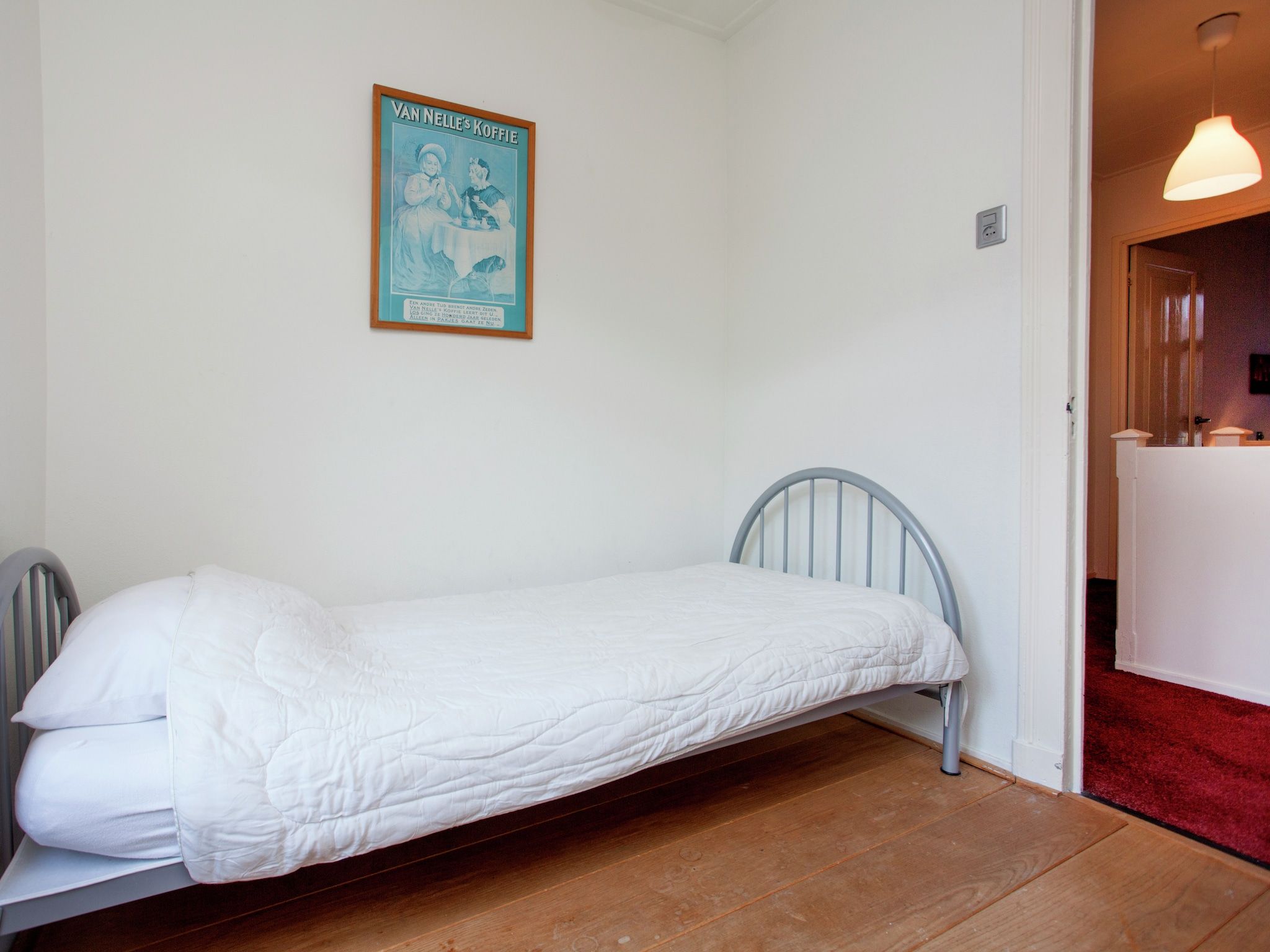 Een slaapkamer van Het Singeltje in Alkmaar