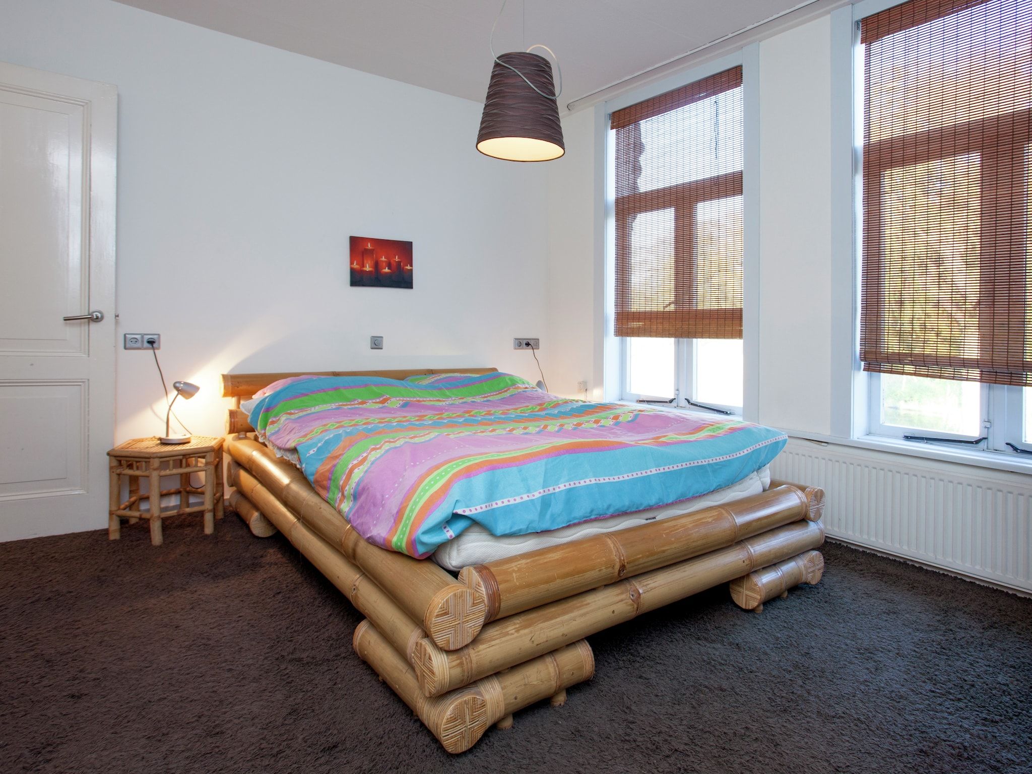Een slaapkamer van Het Singeltje in Alkmaar