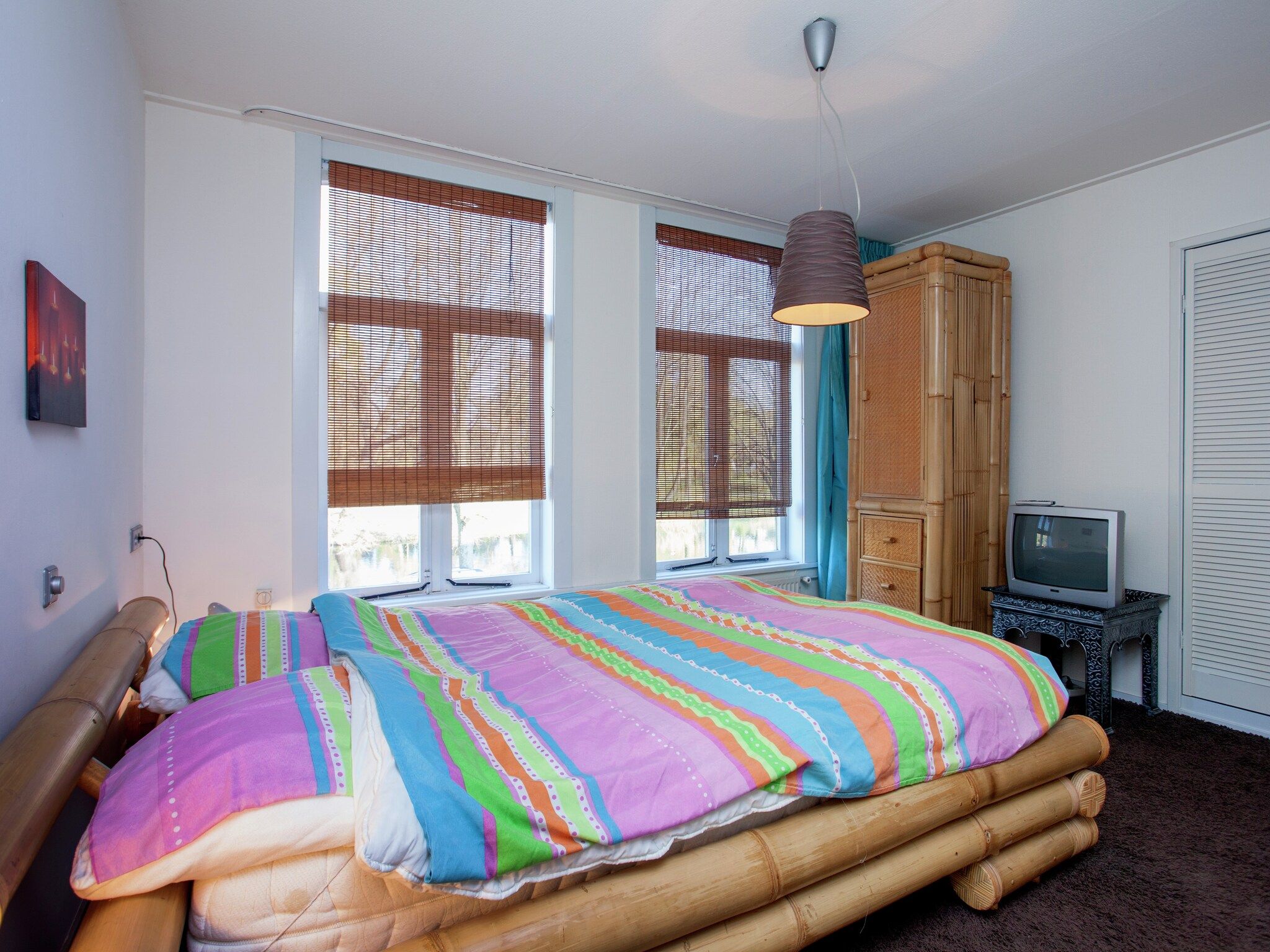 Een slaapkamer van Het Singeltje in Alkmaar