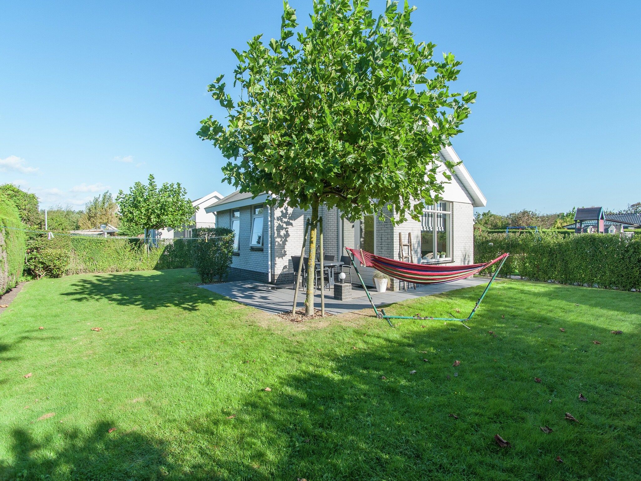 De tuin van Bungalowpark de Gouden Spar 2 in Noordwijk