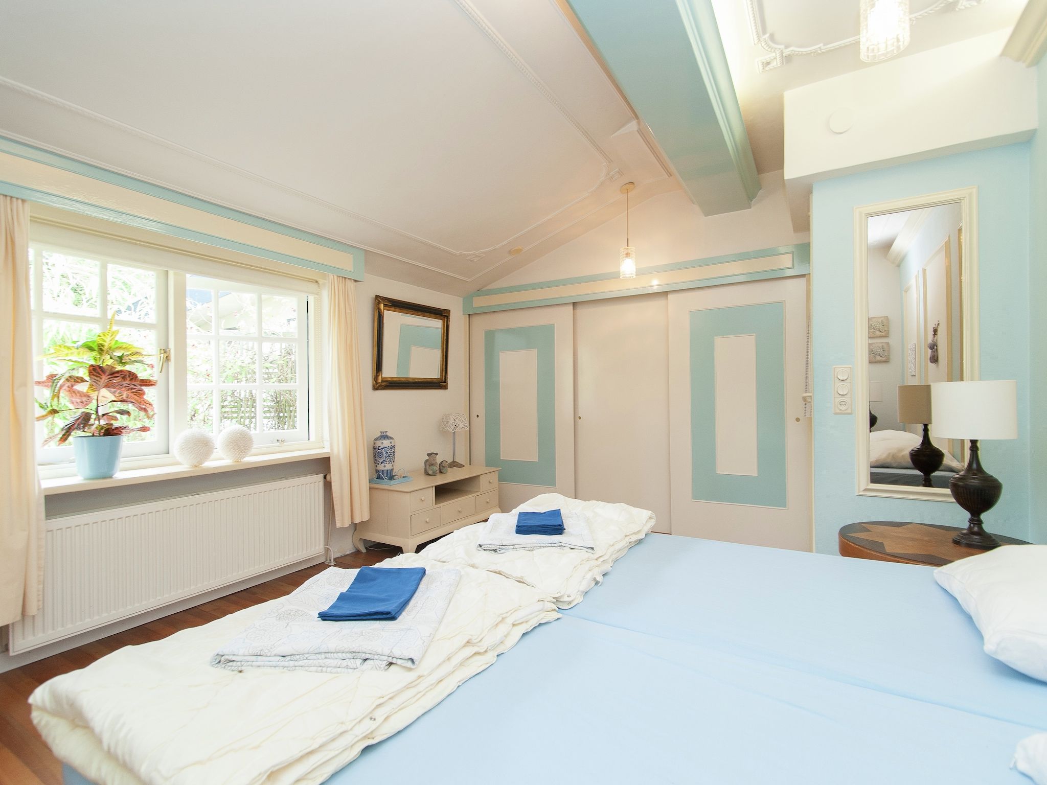 Een slaapkamer van Anna's Place in Schoorl