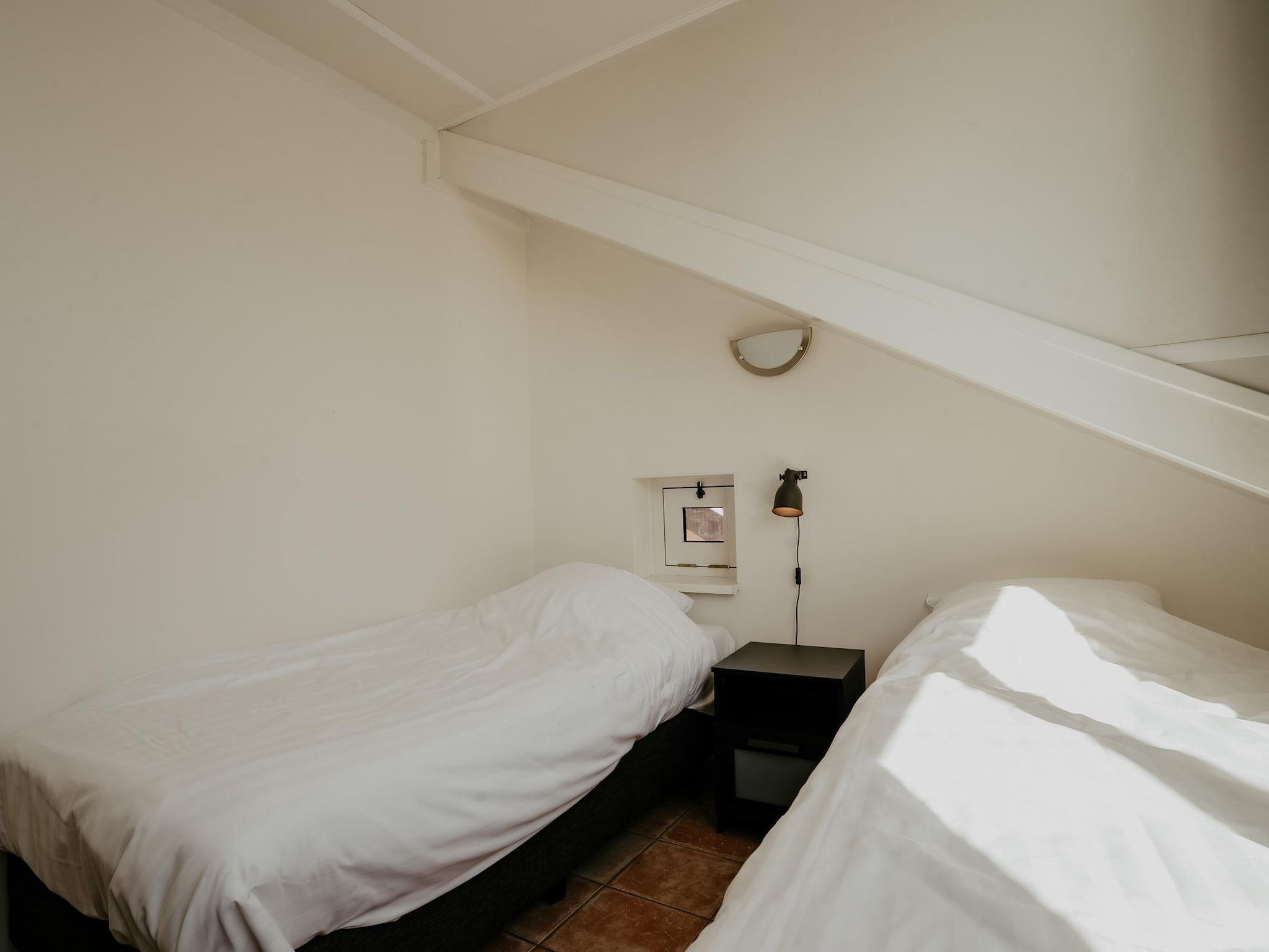 Een slaapkamer van Waterpark de Meerparel 4 in Uitgeest