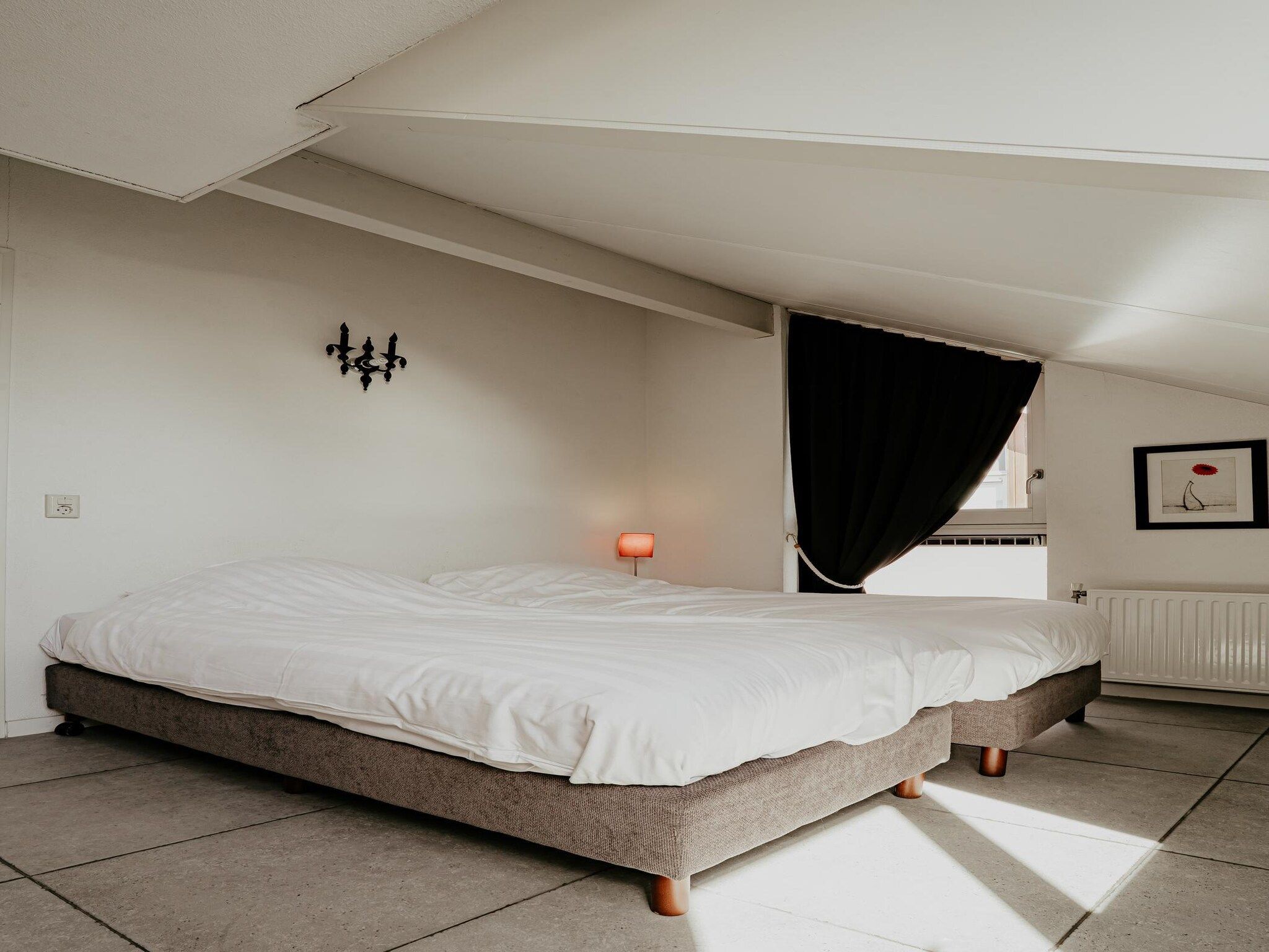 Een slaapkamer van Waterpark de Meerparel 4 in Uitgeest