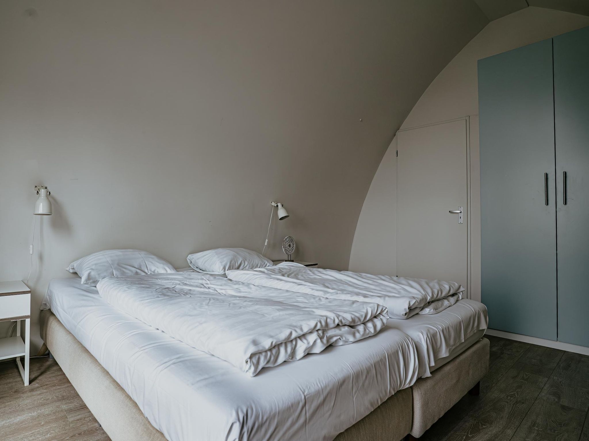 Een slaapkamer van De ZeeParel Sea Fish in Egmond aan zee
