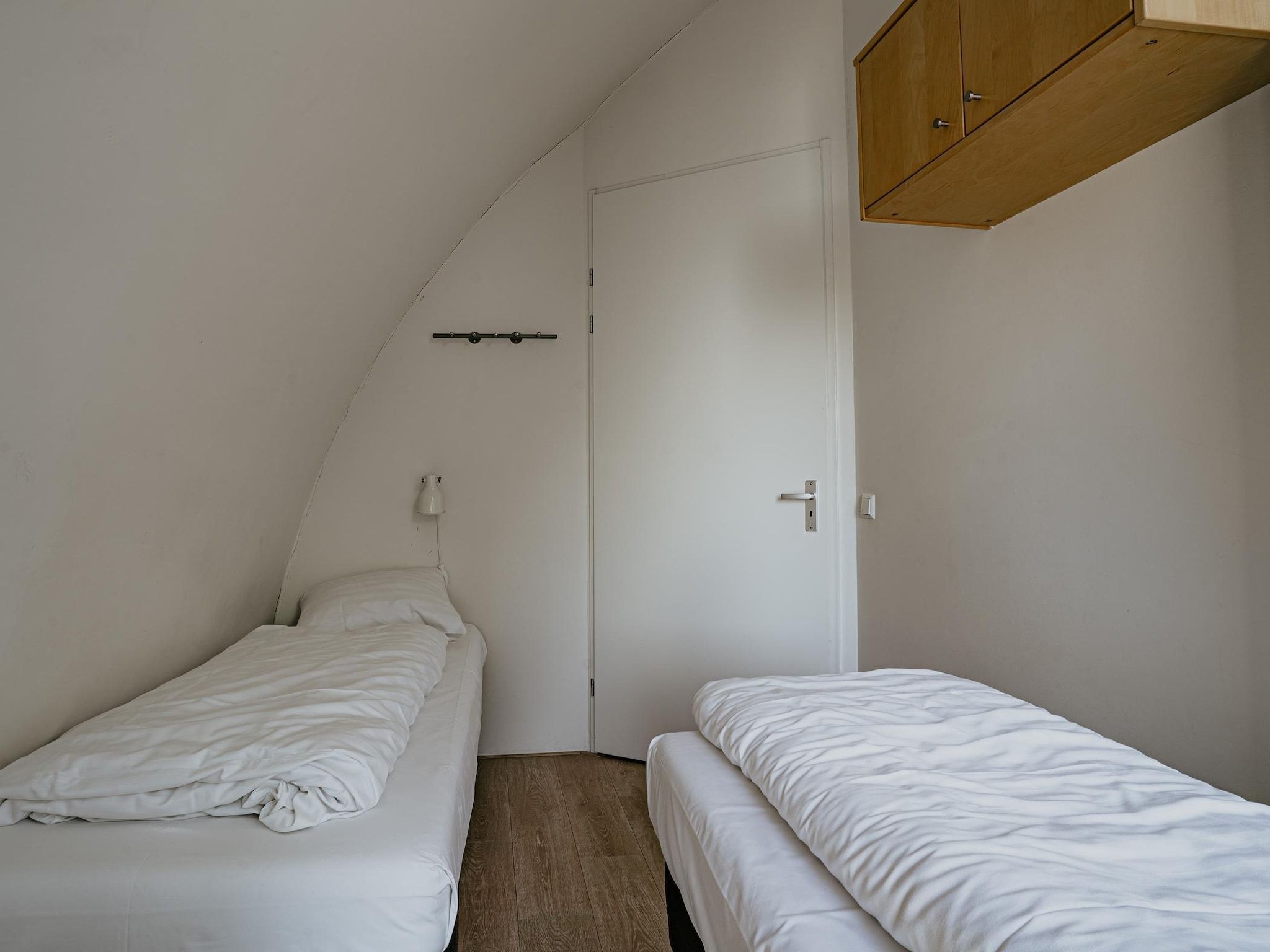 Een slaapkamer van De ZeeParel Sea Life in Egmond aan zee