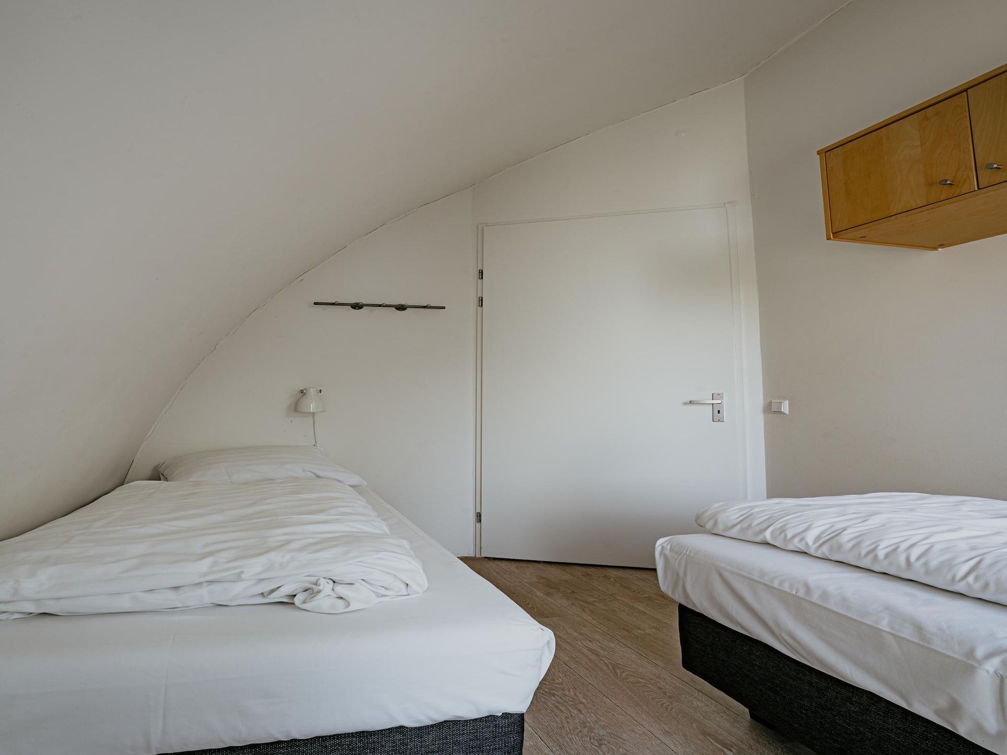 Een slaapkamer van De ZeeParel Sea Life in Egmond aan zee