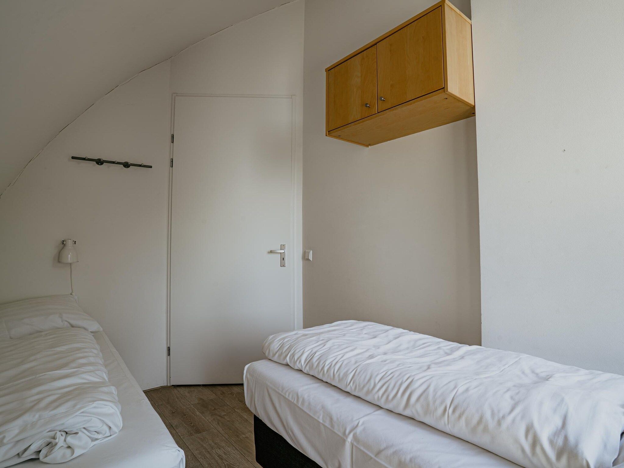 Een slaapkamer van De ZeeParel Sea Life in Egmond aan zee
