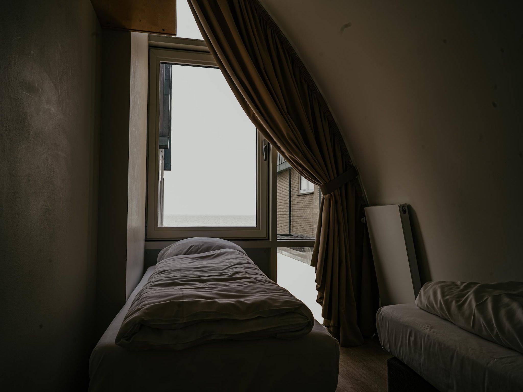 Een slaapkamer van De ZeeParel Sea Life in Egmond aan zee