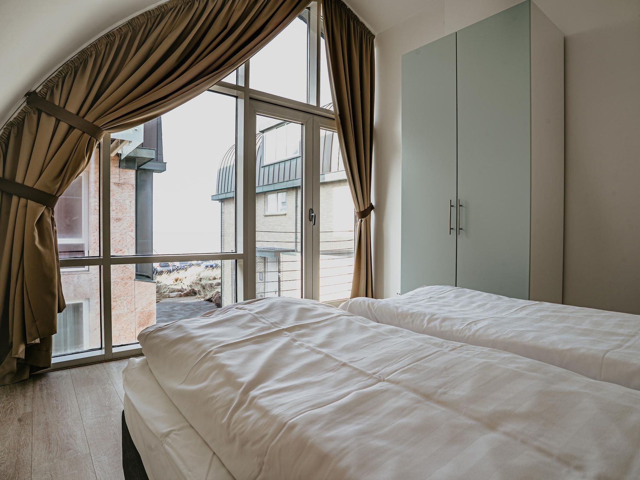 Een slaapkamer van De ZeeParel Sea Life in Egmond aan zee