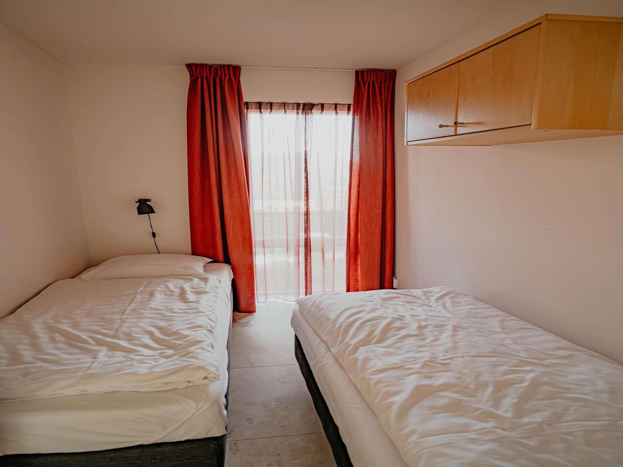 Een slaapkamer van De ZeeParel Sea Crab in Egmond aan zee