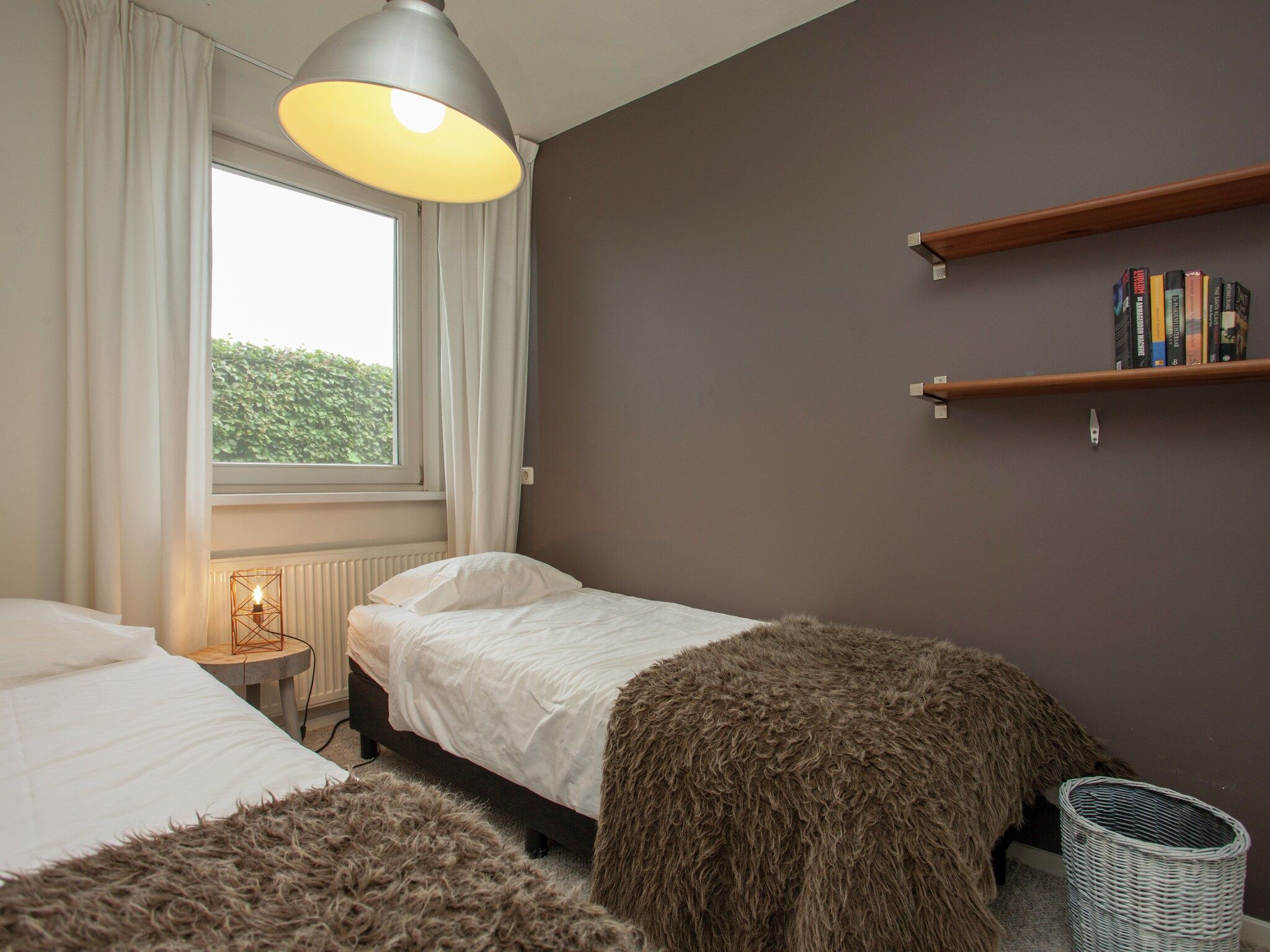 Een slaapkamer van Dorpswoning Het Landelijke in Leende