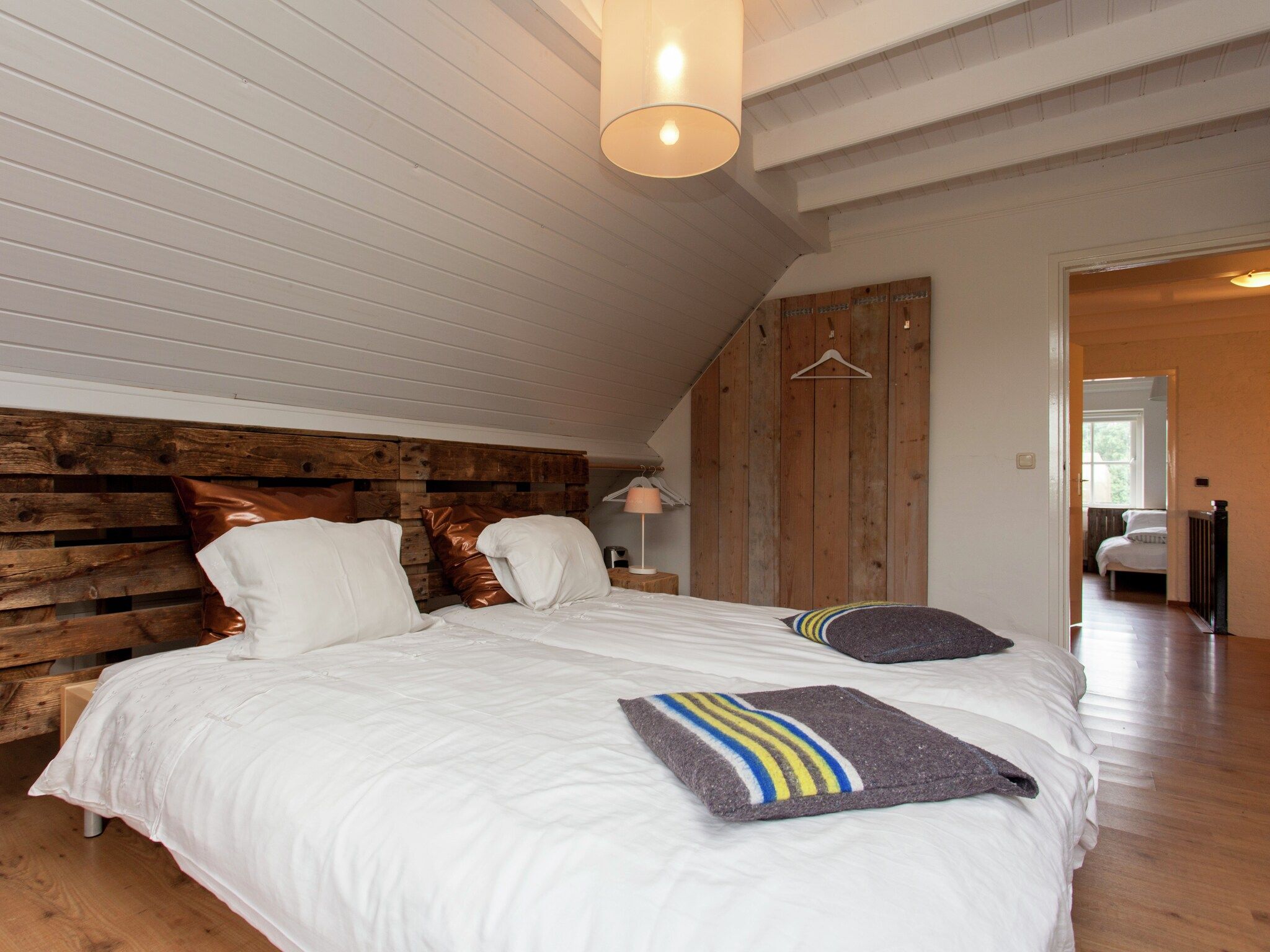 Een slaapkamer van Dorpswoning De Plek in Leende
