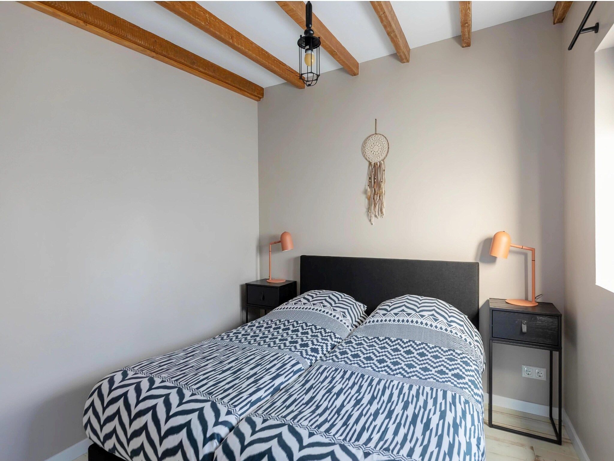 Een slaapkamer van de Biotoop in Callantsoog