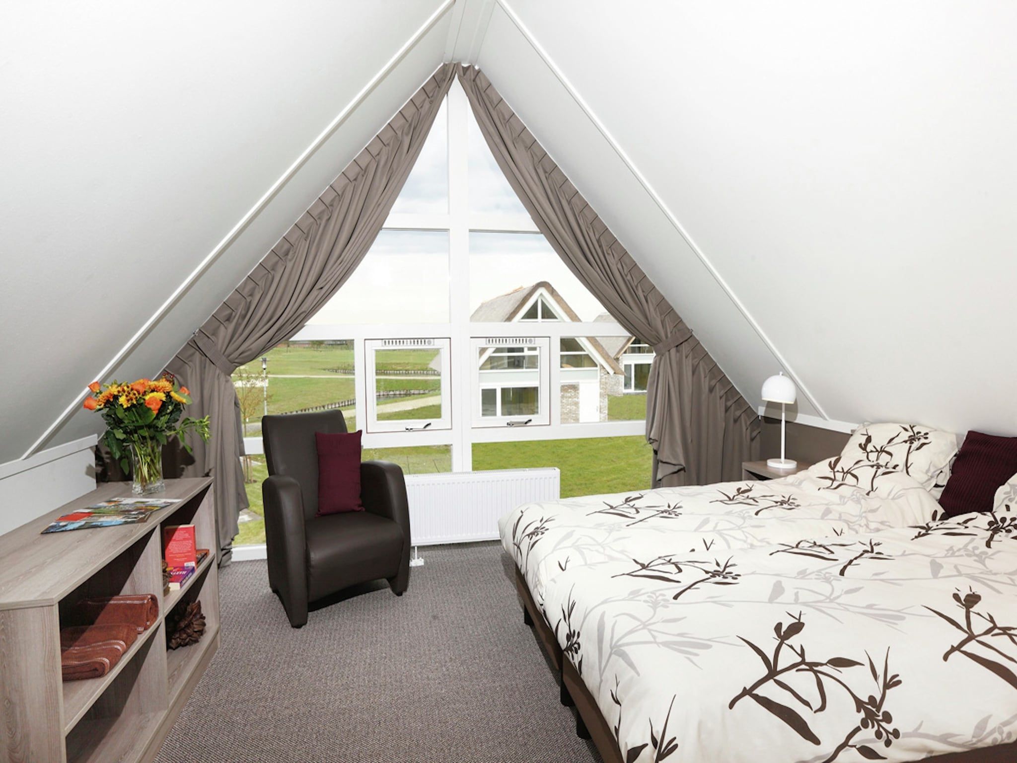 Een slaapkamer van Villapark Akenveen 1 in Tynaarlo