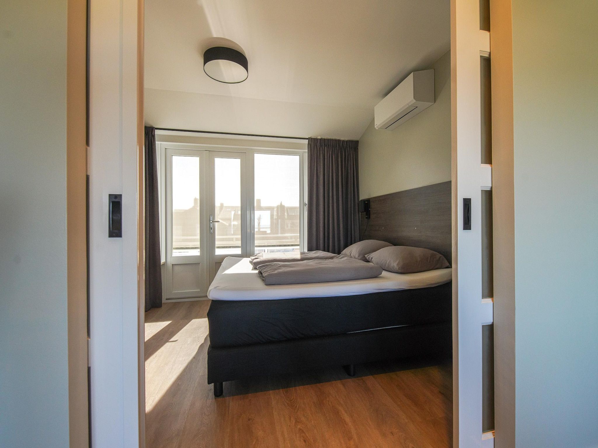 Een slaapkamer van Ziezee in Katwijk