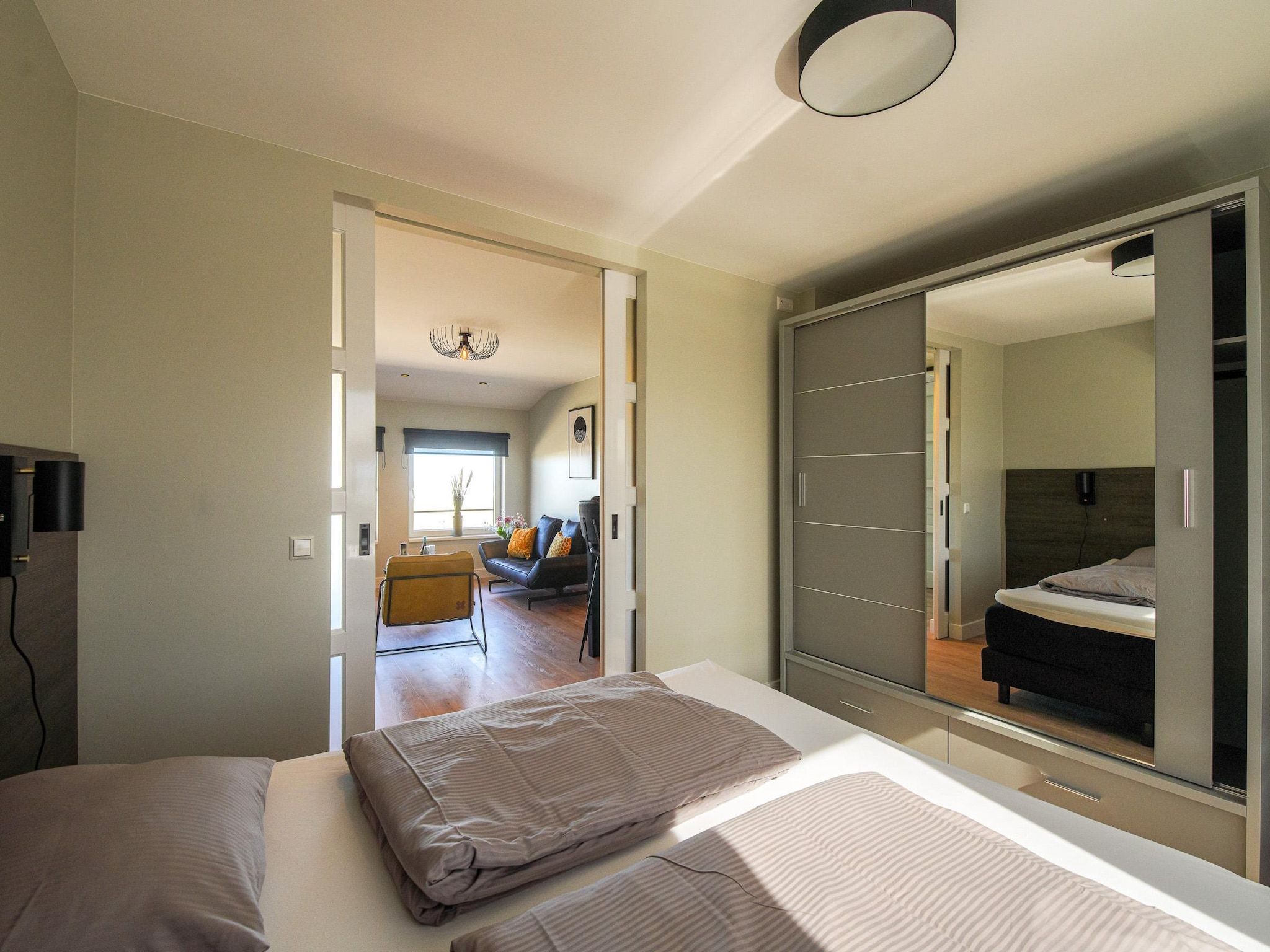 Een slaapkamer van Ziezee in Katwijk