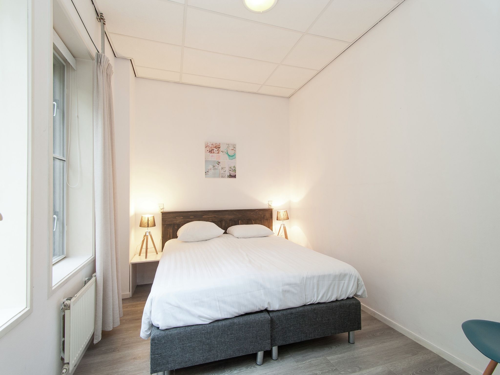 Een slaapkamer van Huize Glory Parel in Bergen aan zee
