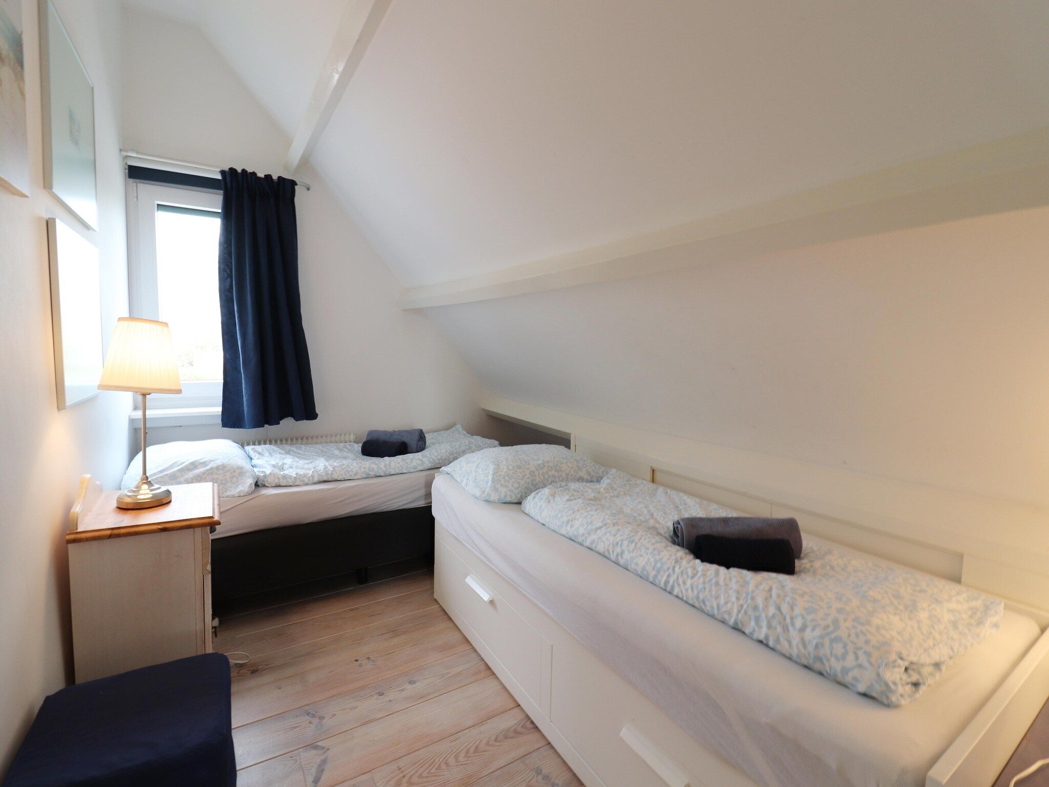 Een slaapkamer van Marie aan Zee in Noordwijkerhout