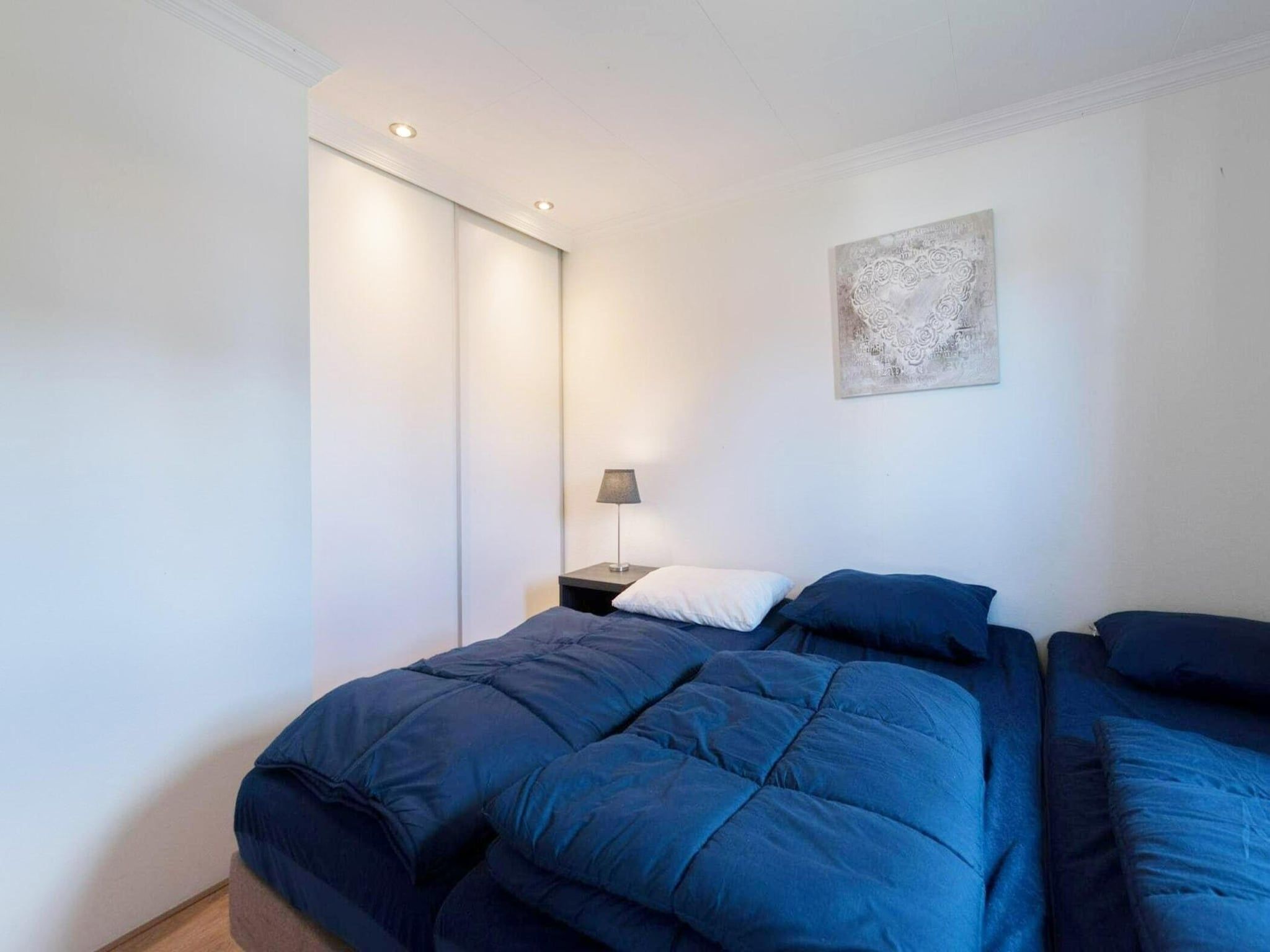 Een slaapkamer van De Edammer  6 personen in West-Graftdijk