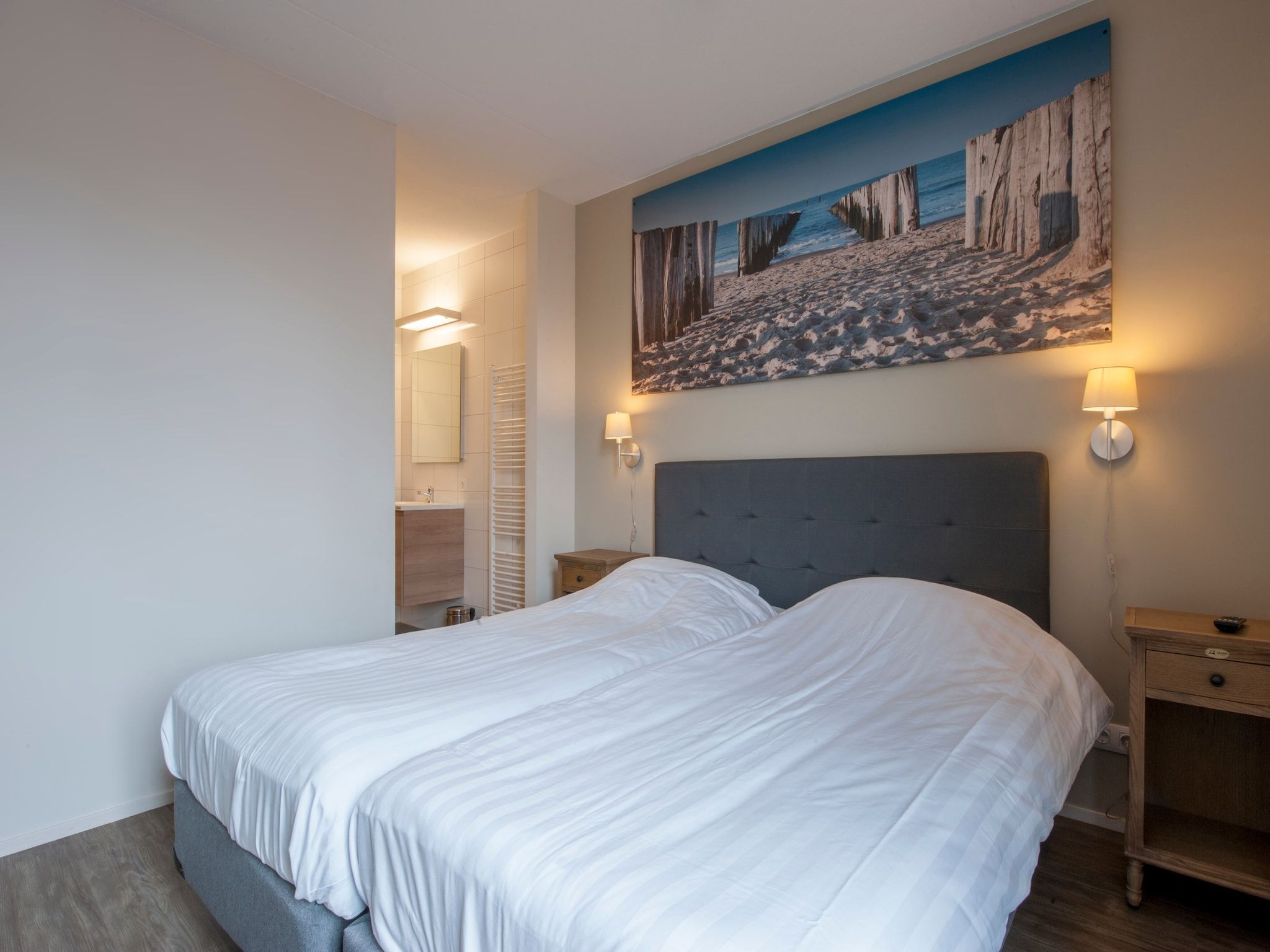 Een slaapkamer van Résidence Wijngaerde 8 in Domburg