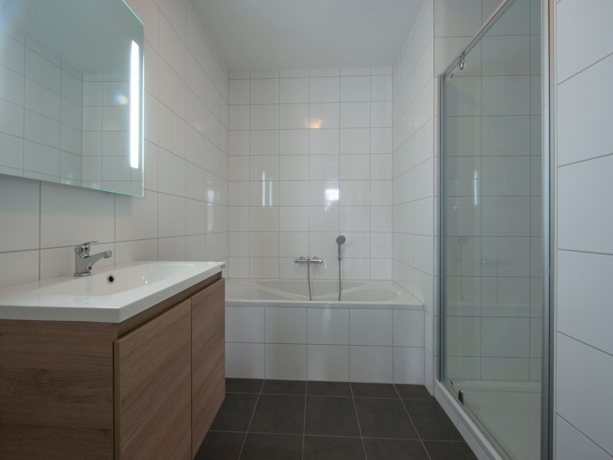 De badkamer van Résidence Wijngaerde 8 in Domburg