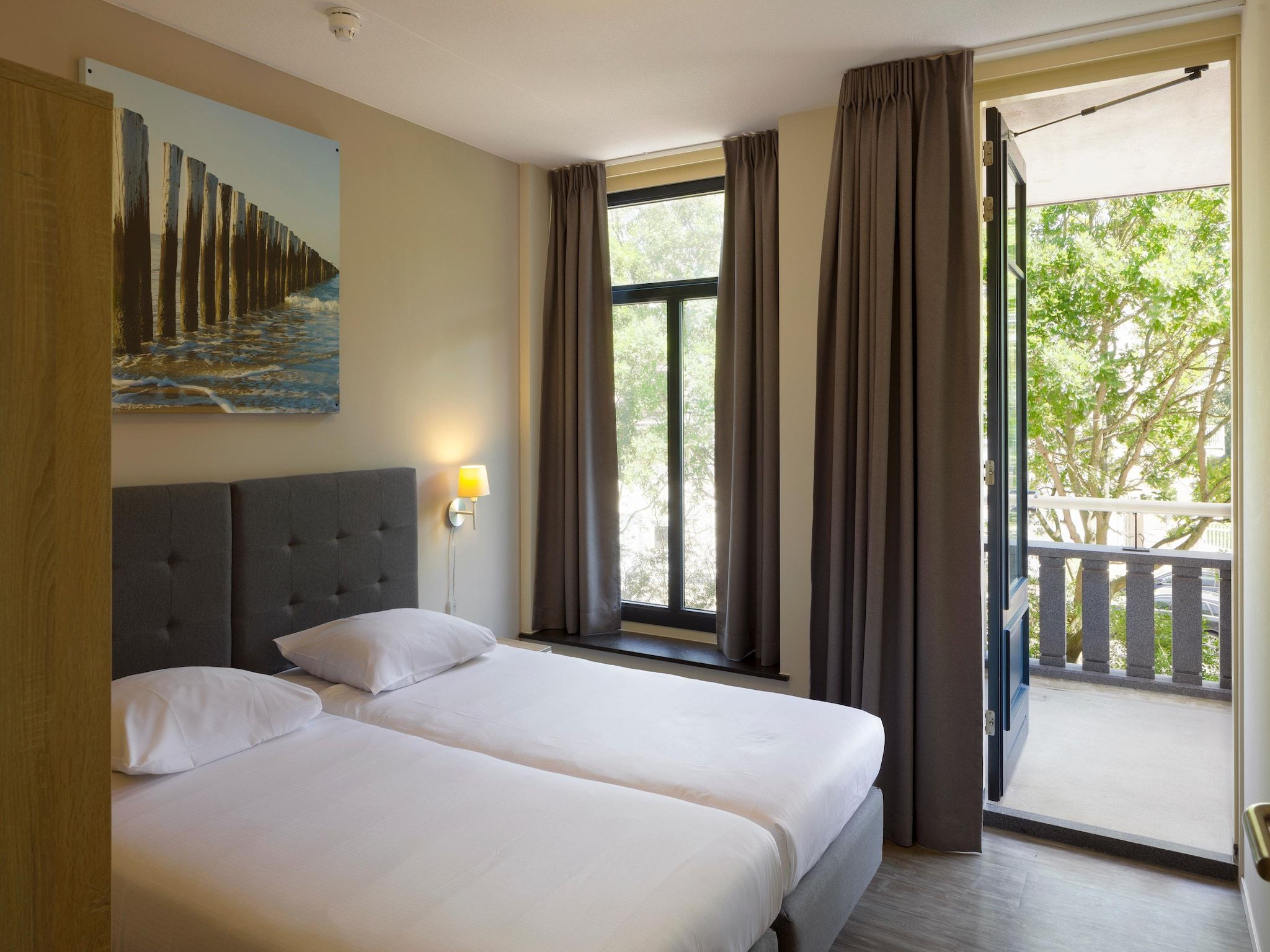 Een slaapkamer van Résidence Wijngaerde 8 in Domburg
