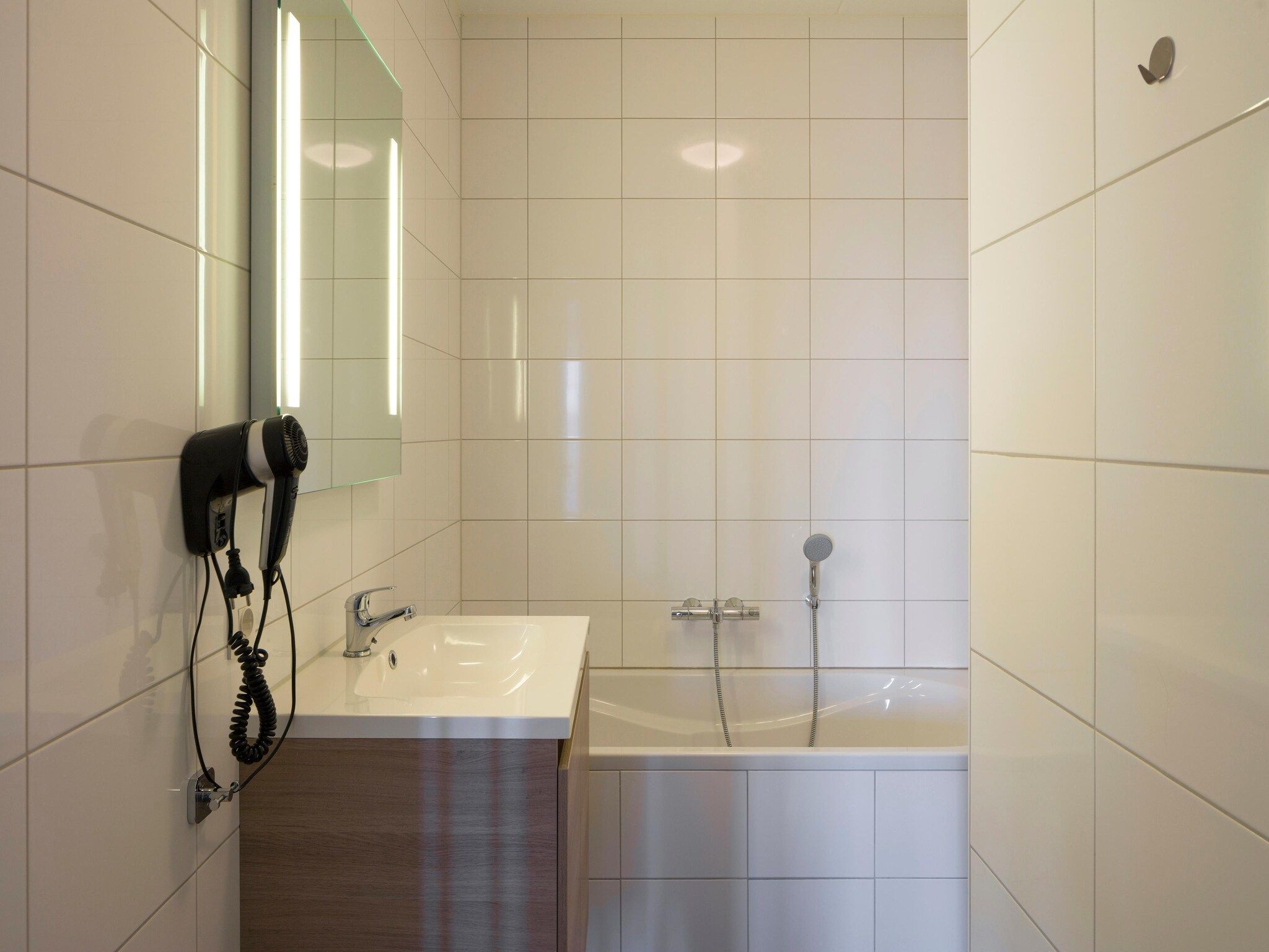 De badkamer van Résidence Wijngaerde 3 in Domburg
