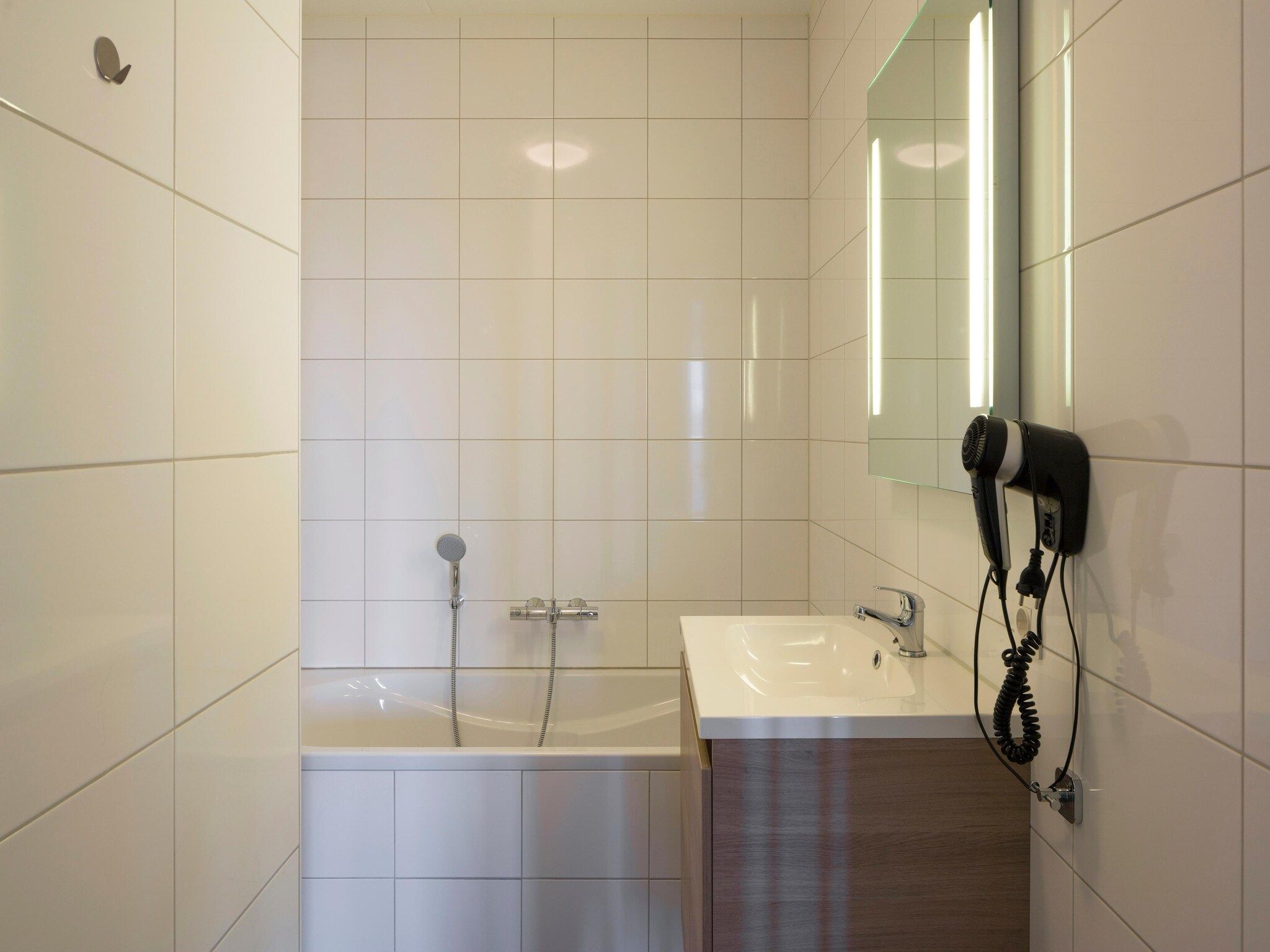 De badkamer van Résidence Wijngaerde 3 in Domburg