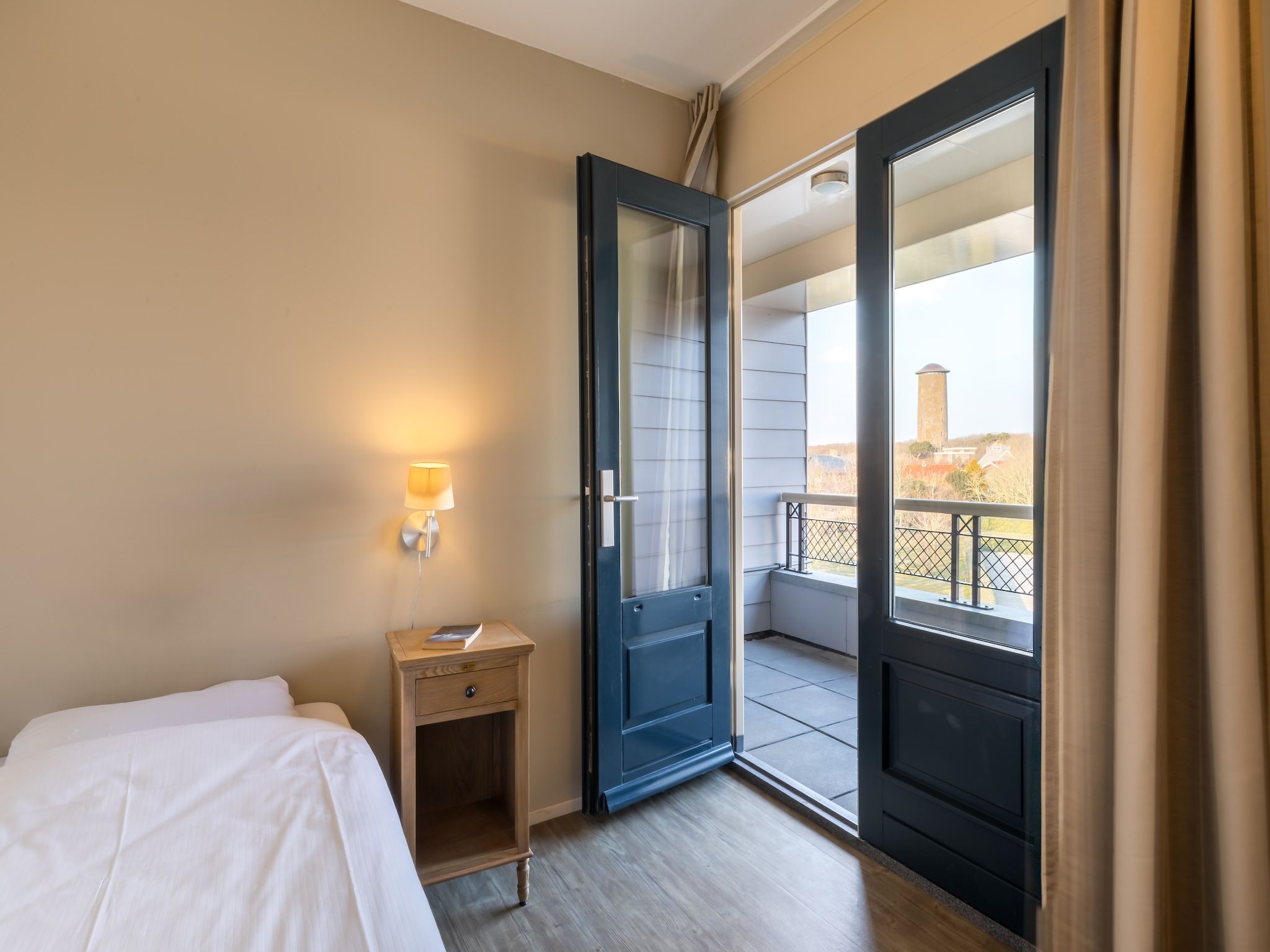 Een slaapkamer van Résidence Wijngaerde 2 in Domburg