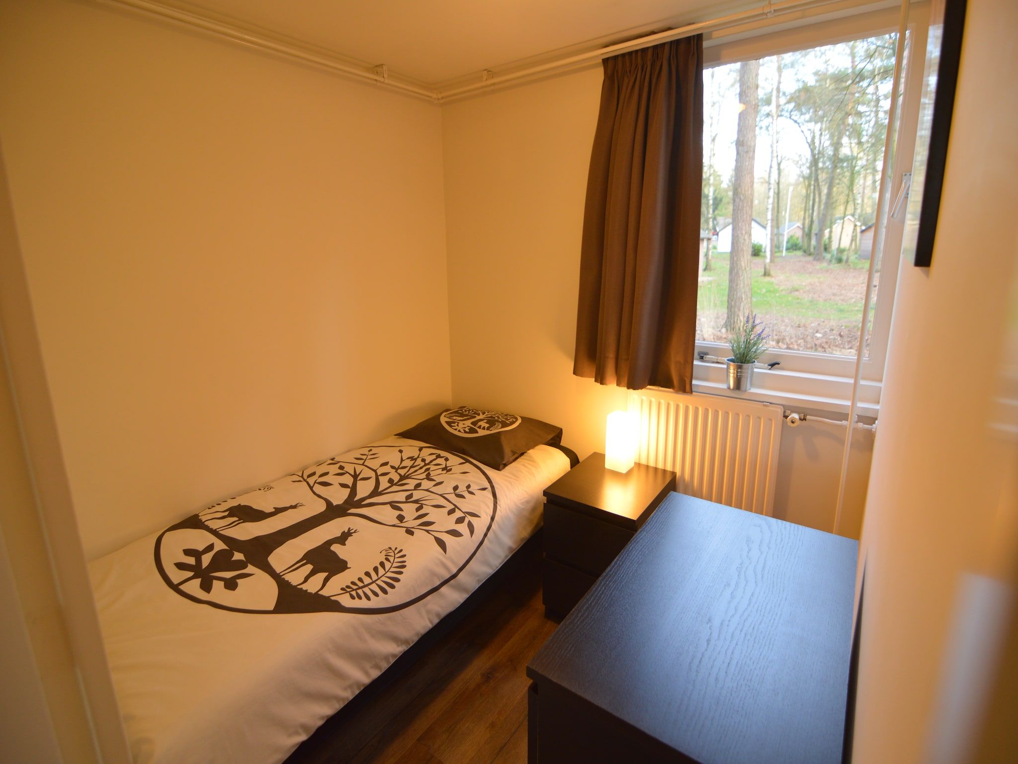 Een slaapkamer van Bungalow 27 in Stramproy
