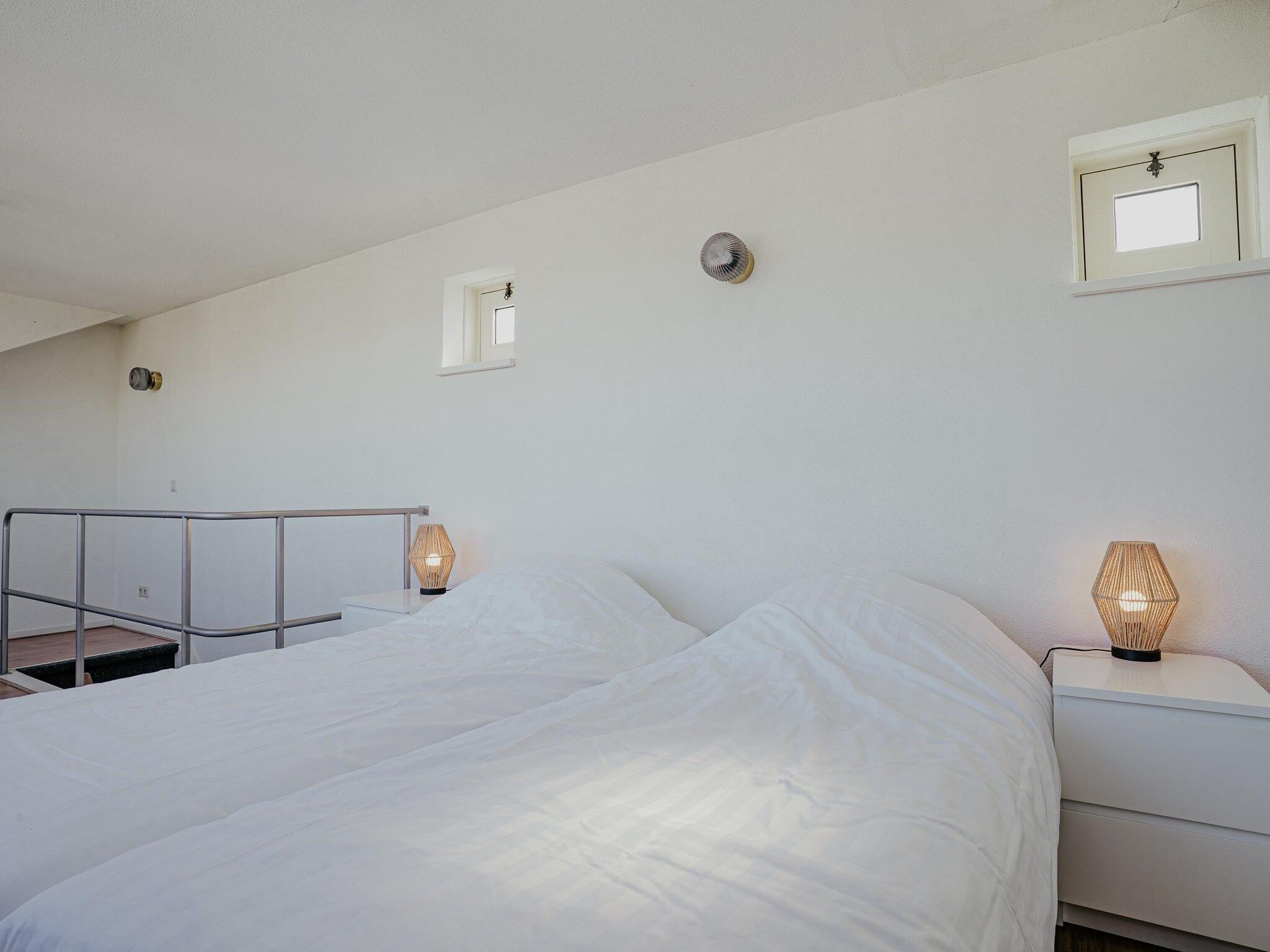 Een slaapkamer van Waterpark de Meerparel 2 in Uitgeest
