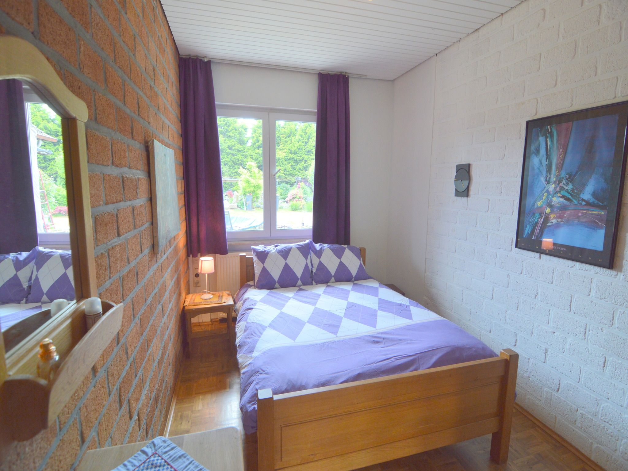 Een slaapkamer van De Sjuur in Sweikhuizen