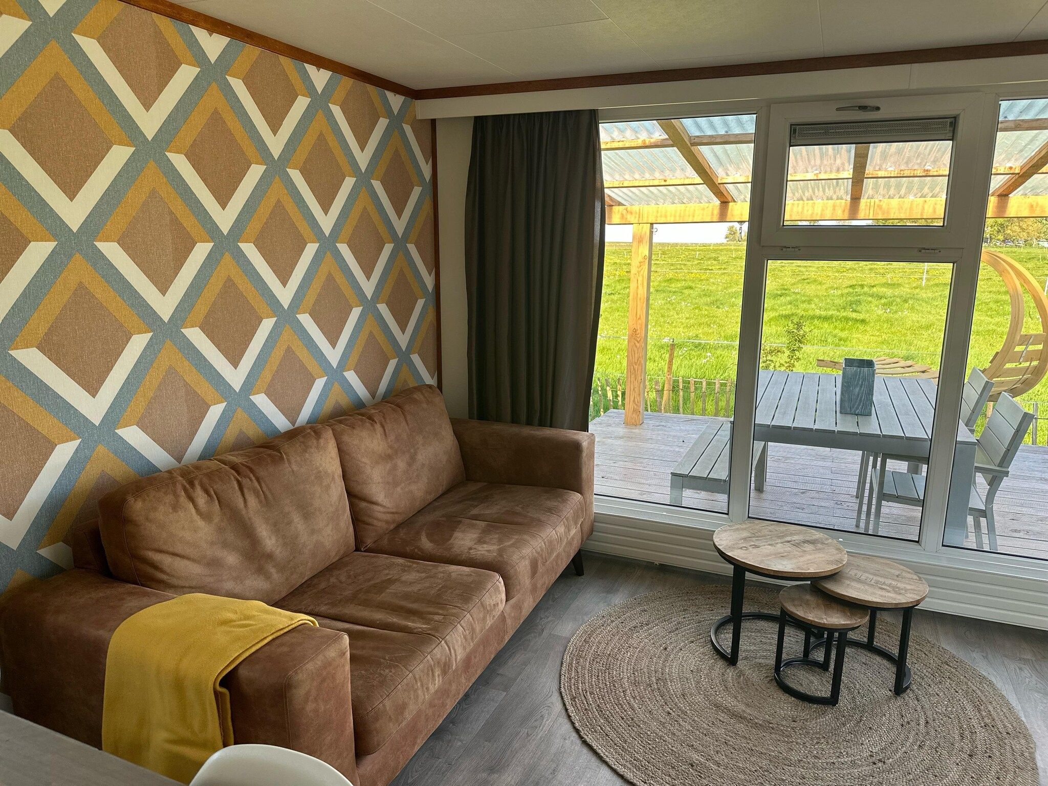 De woonkamer van Recreatiepark Wiringherlant - Wiringher Chalet 10 in Hippolytushoef