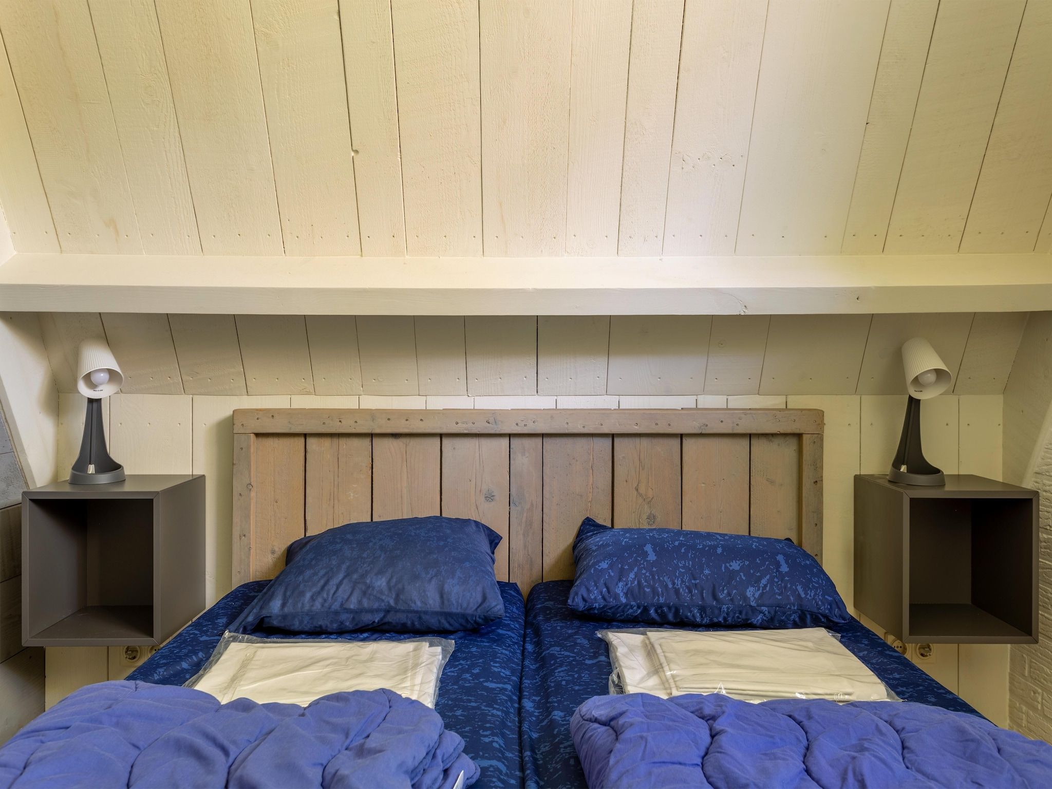 Een slaapkamer van Vosseven 84 Moseik in Stramproy