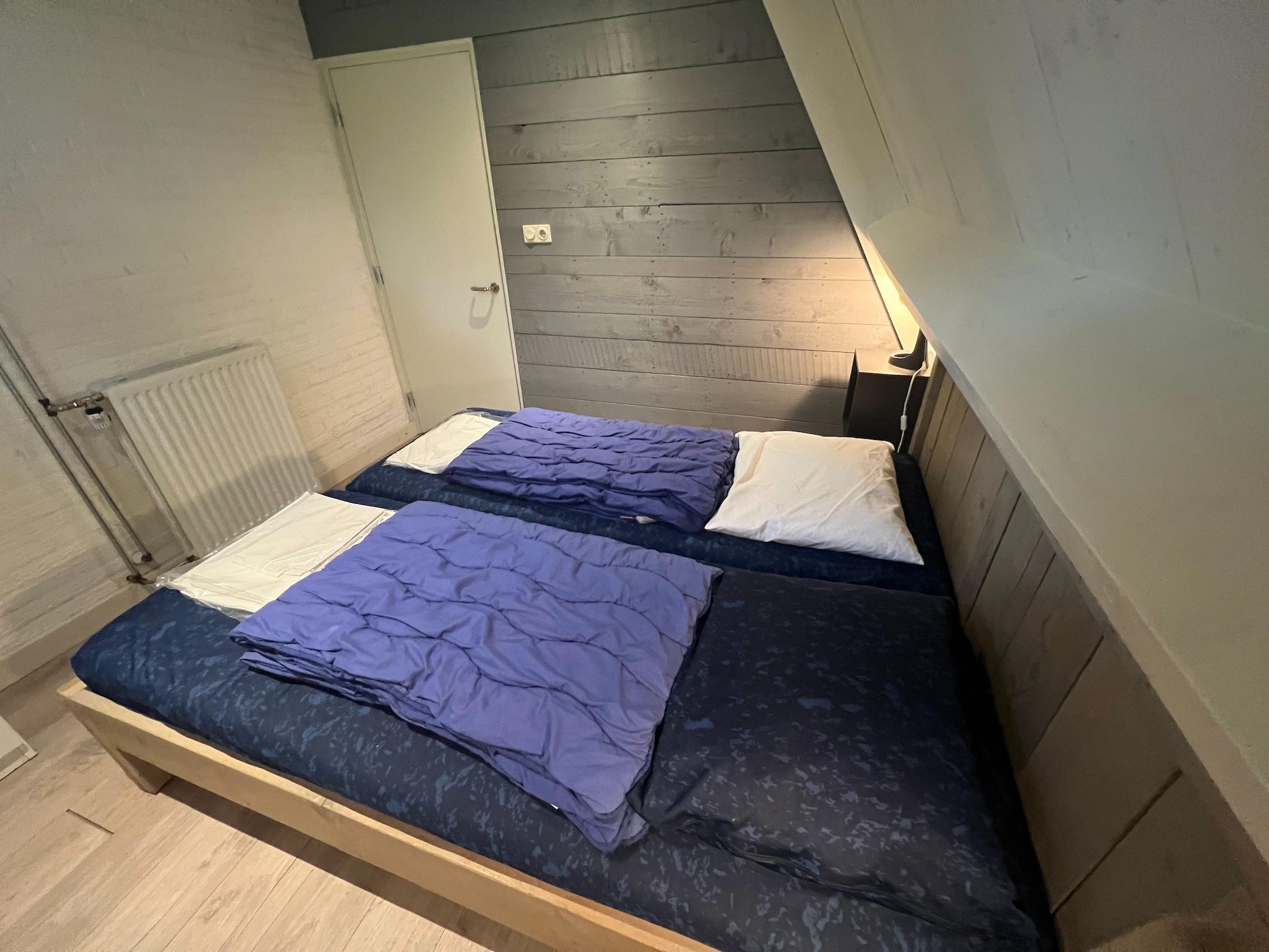 Een slaapkamer van Vosseven 84 Moseik in Stramproy