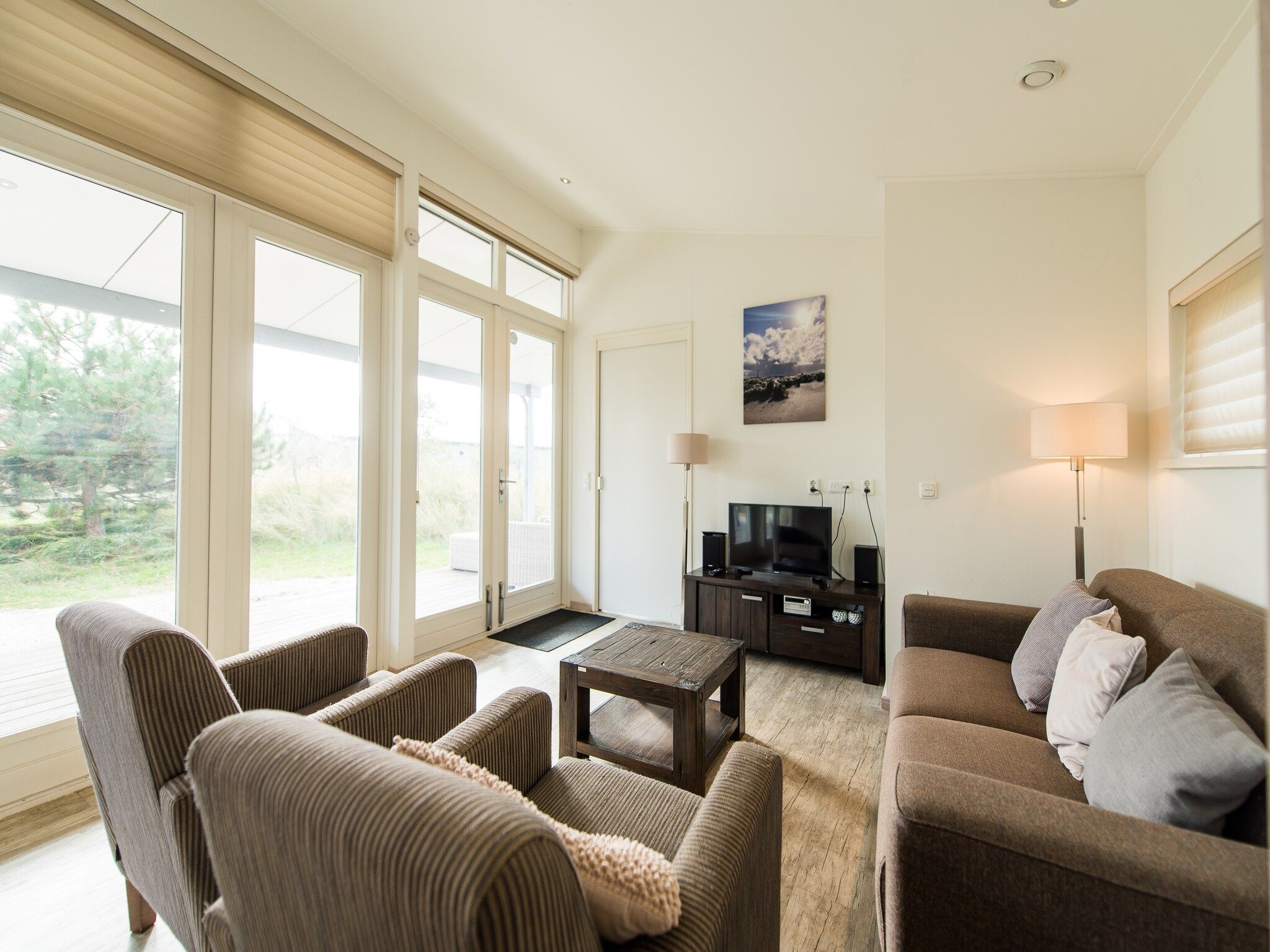 De woonkamer van Vakantiepark Boomhiemke 7 in Hollum-Ameland