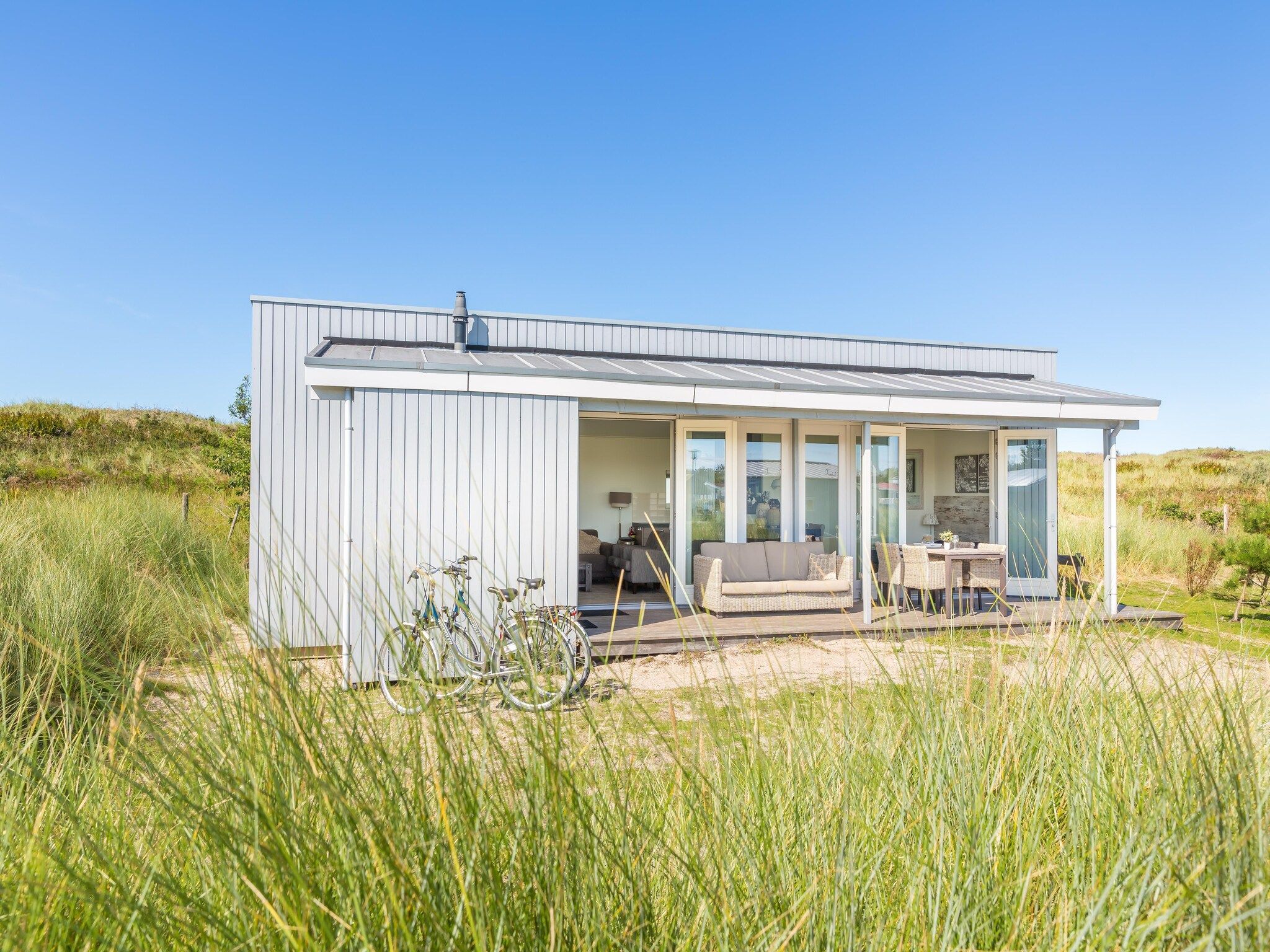 De buitenkant van Vakantiepark Boomhiemke 7 in Hollum-Ameland