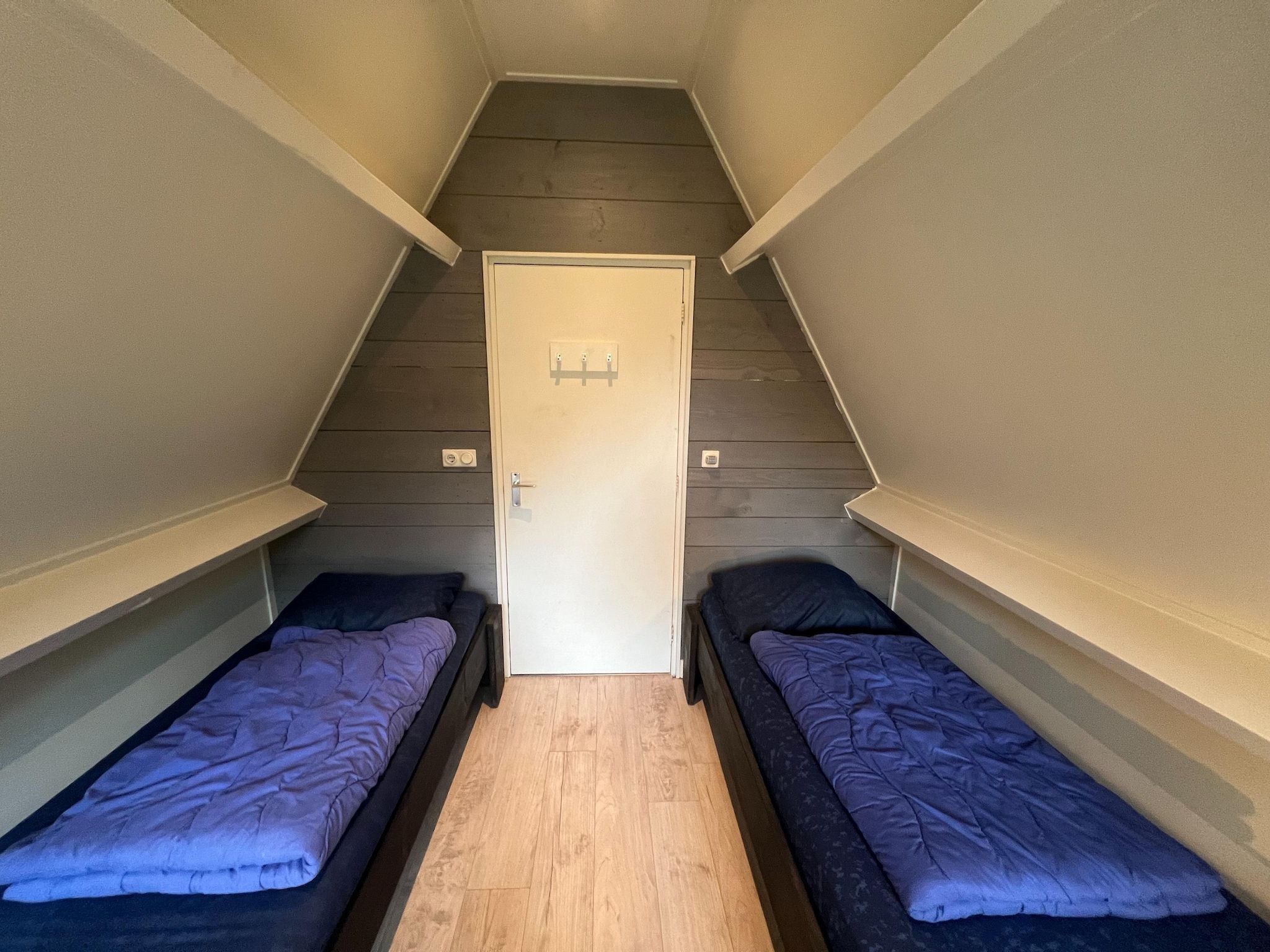 Een slaapkamer van Vosseven 85 Muizeoortje in Stramproy