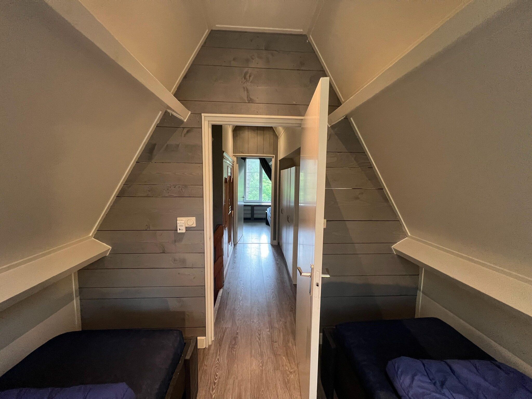 Een slaapkamer van Vosseven 85 Muizeoortje in Stramproy