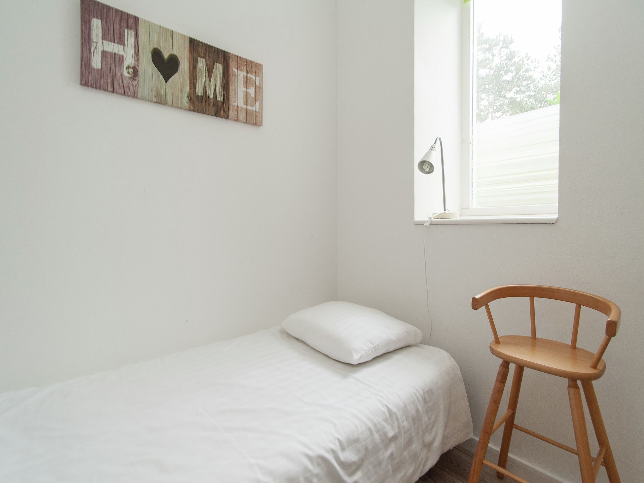 Een slaapkamer van Huize Glory Citrien in Bergen aan zee