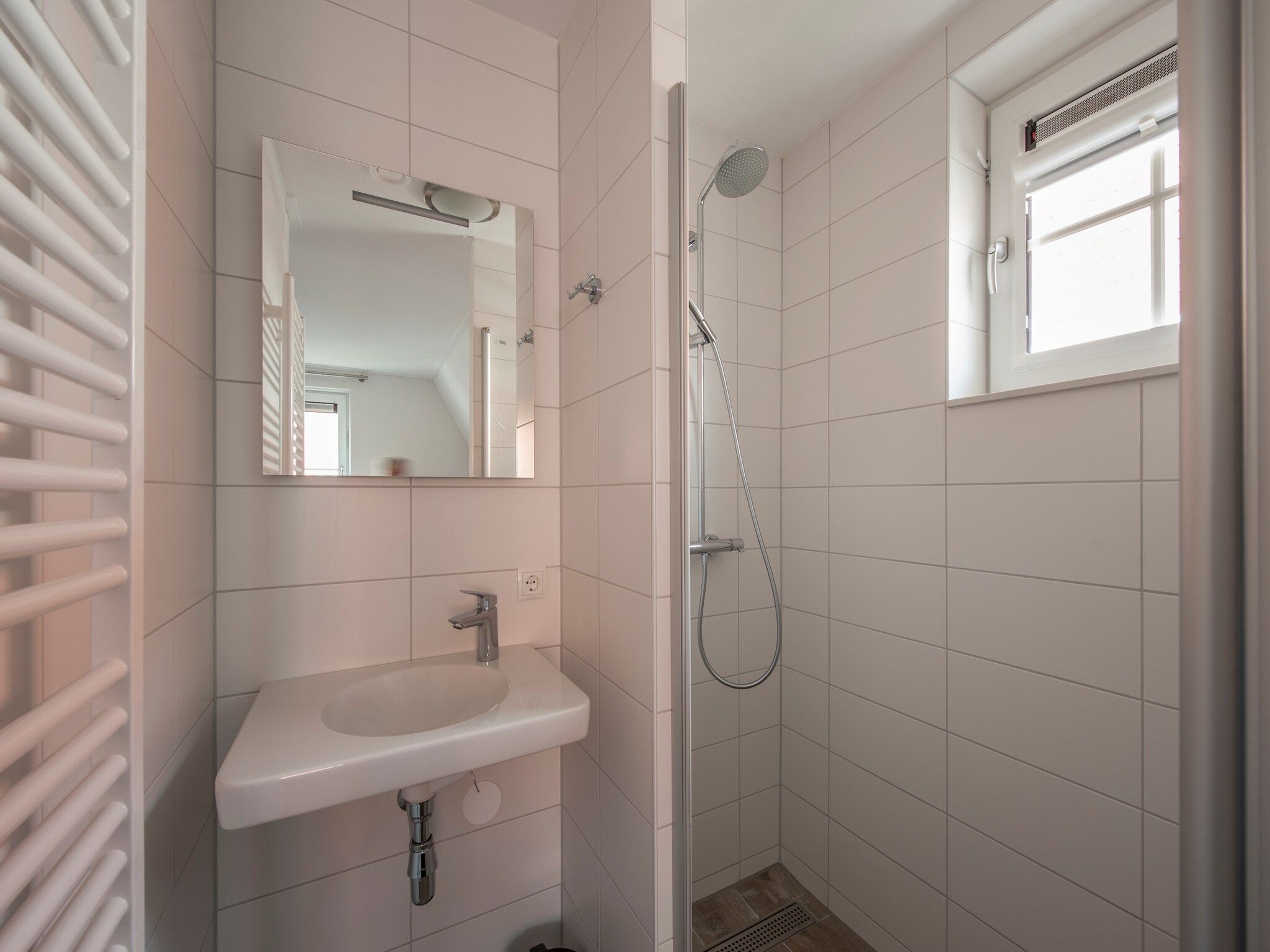 De badkamer van Noordzee Résidence Dishoek 3 in Koudekerke