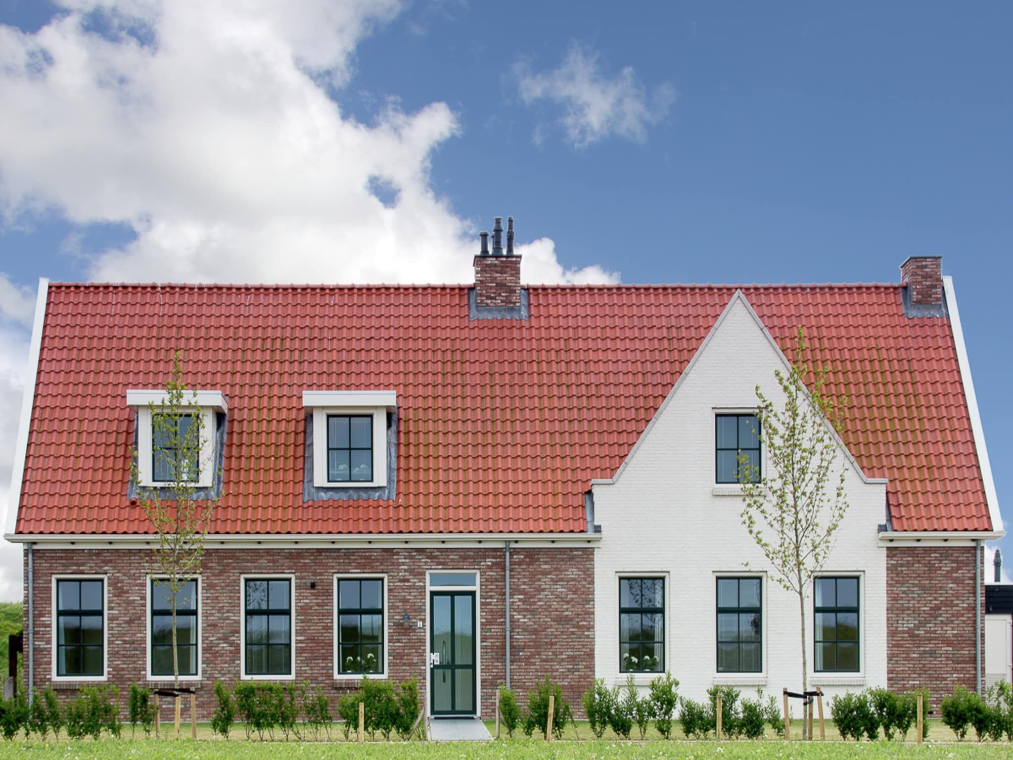 De buitenkant van Luxe Beveland met Zwembad in Colijnsplaat