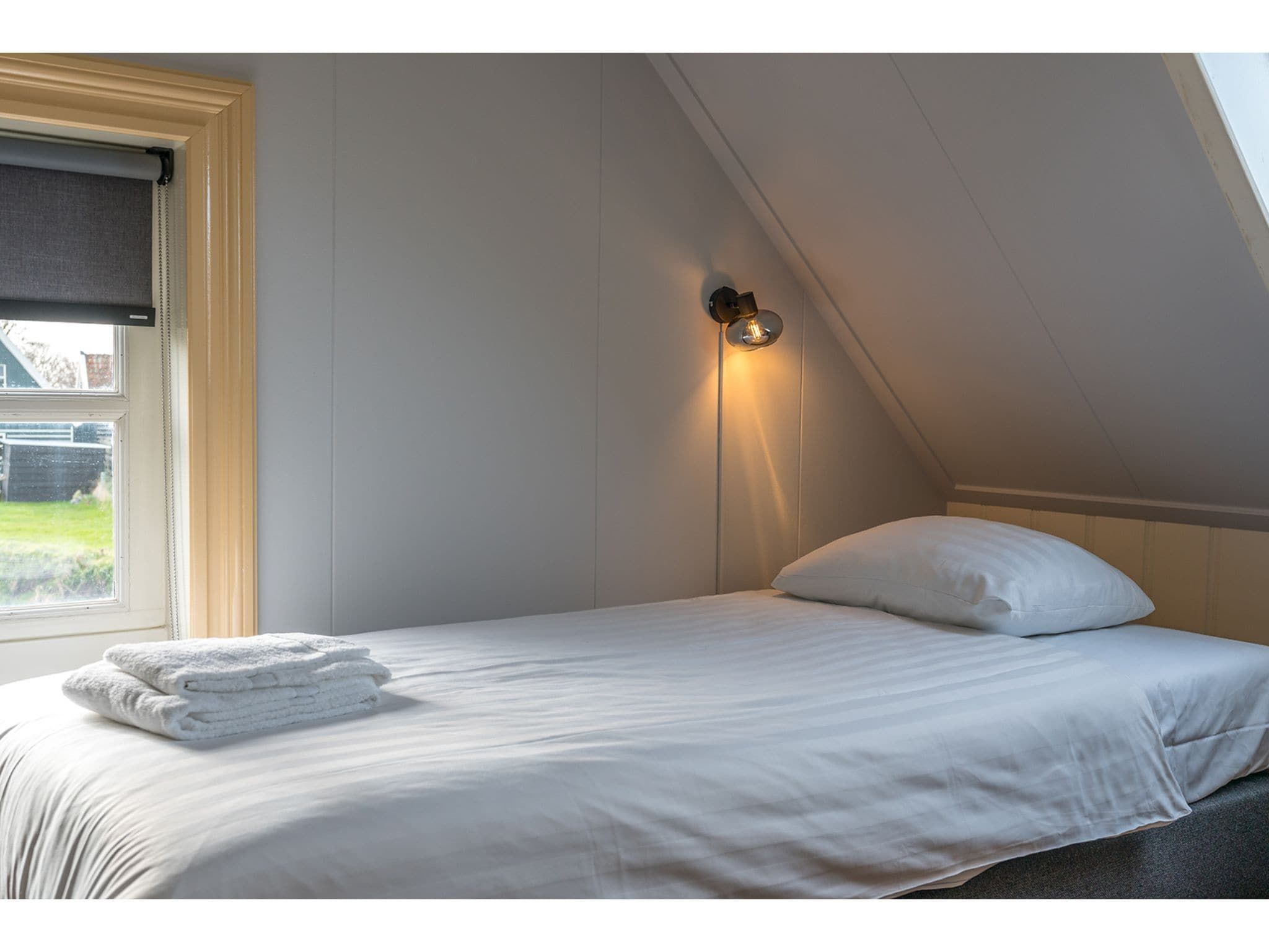 Een slaapkamer van Florijn 1 in Oost-Texel