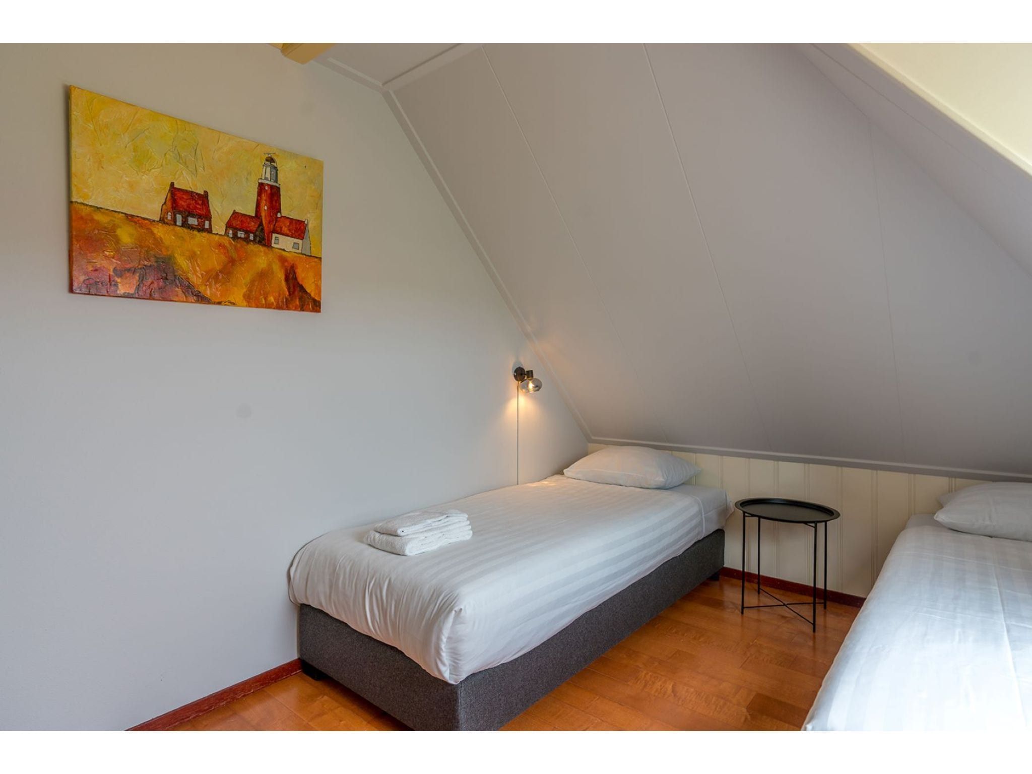 Een slaapkamer van Florijn 4 in Oost-Texel