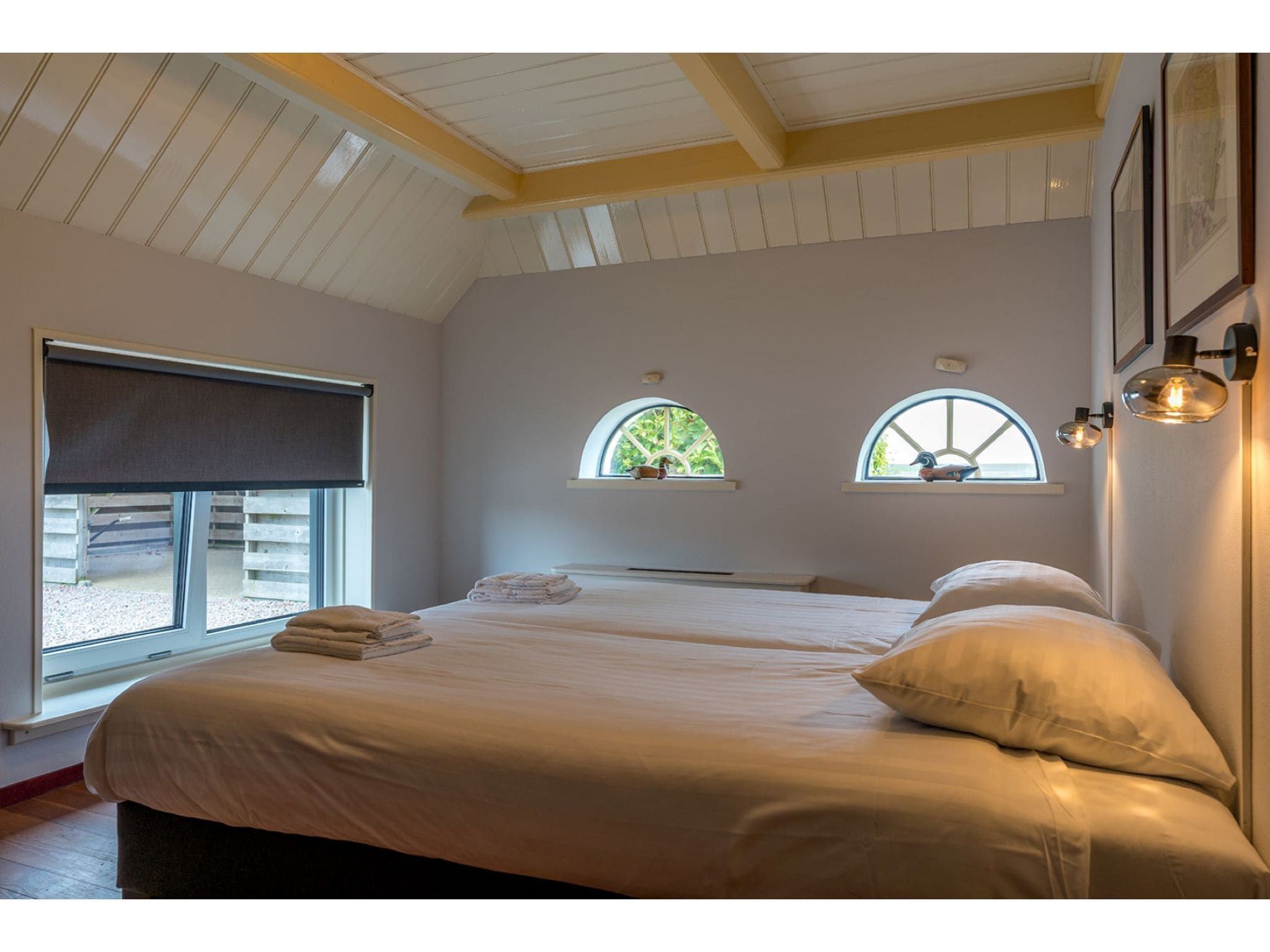 Een slaapkamer van Florijn 4 in Oost-Texel