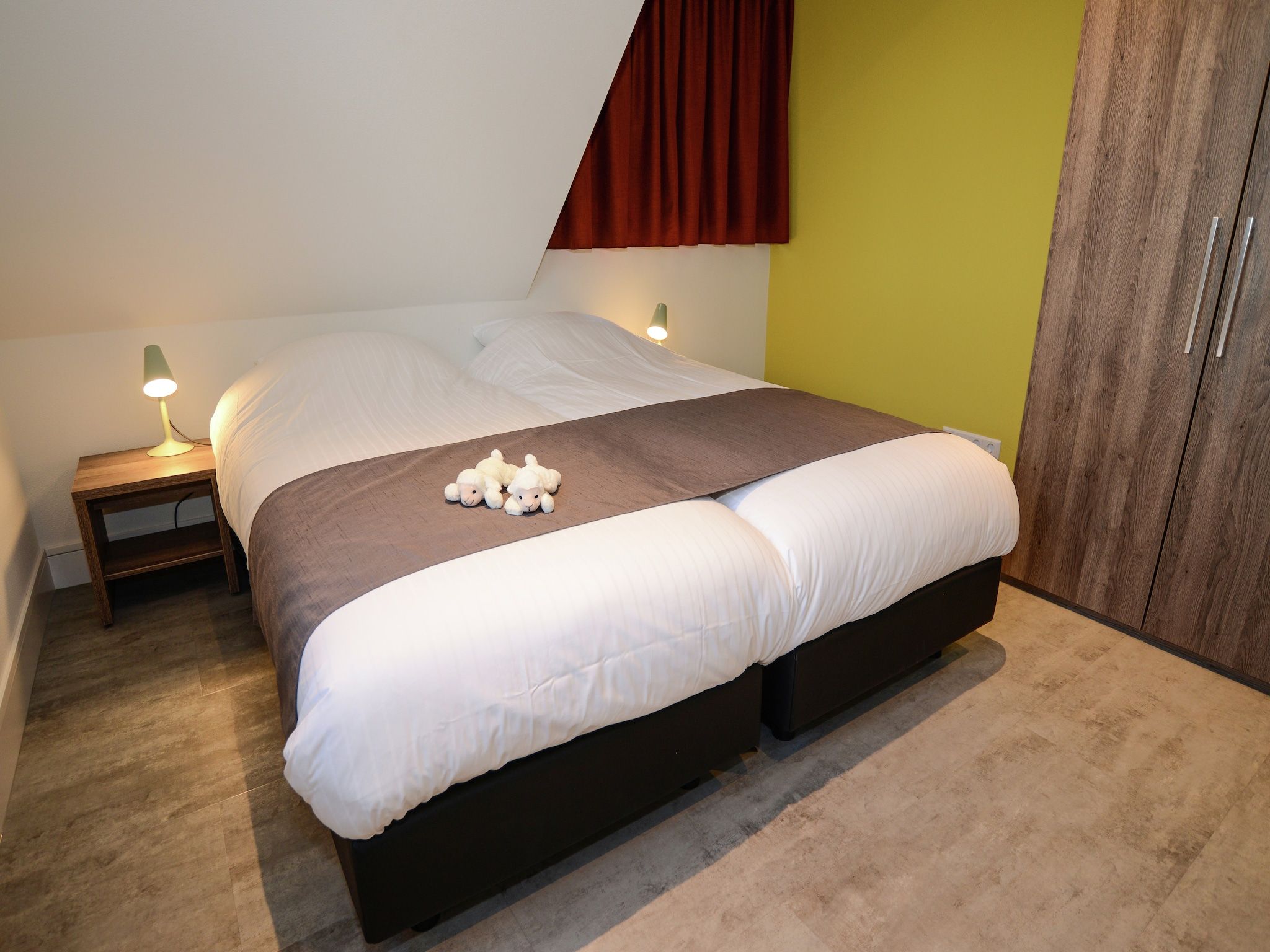 Een slaapkamer van Villa Hoogelandt 70 in De Koog-Texel