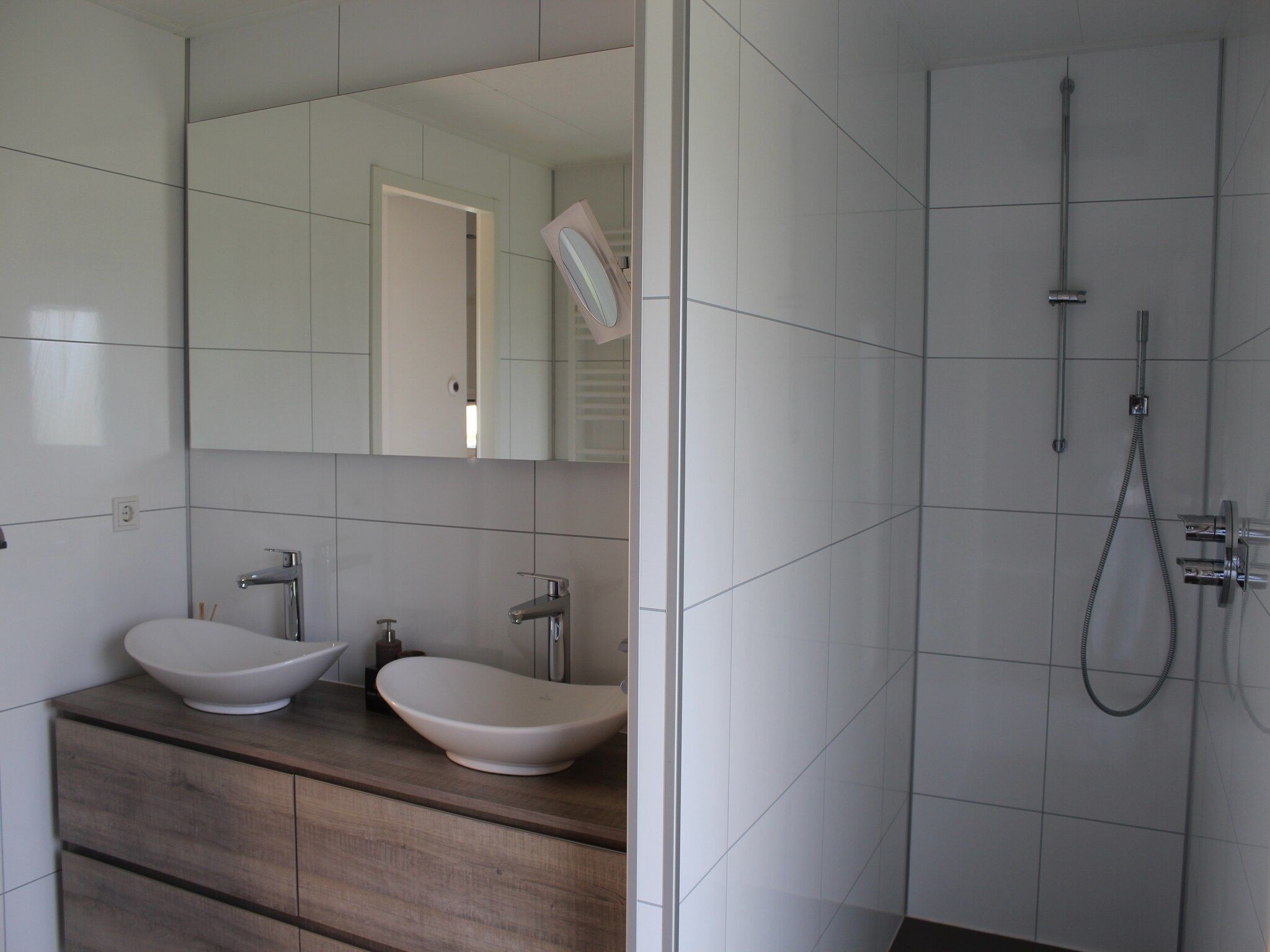 De badkamer van Resort Mooi Bemelen 5 in Bemelen
