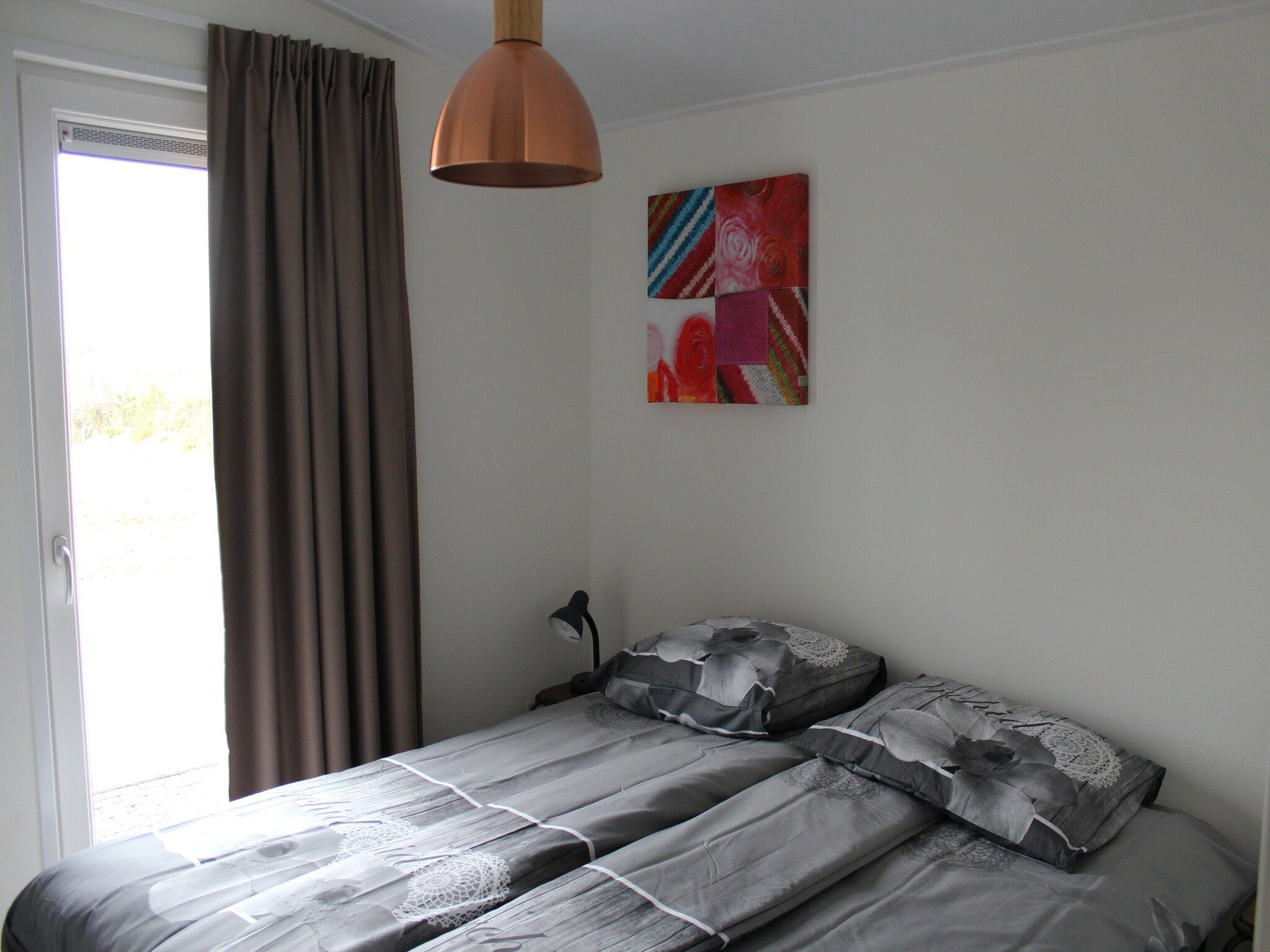 Een slaapkamer van Resort Mooi Bemelen 3 in Bemelen